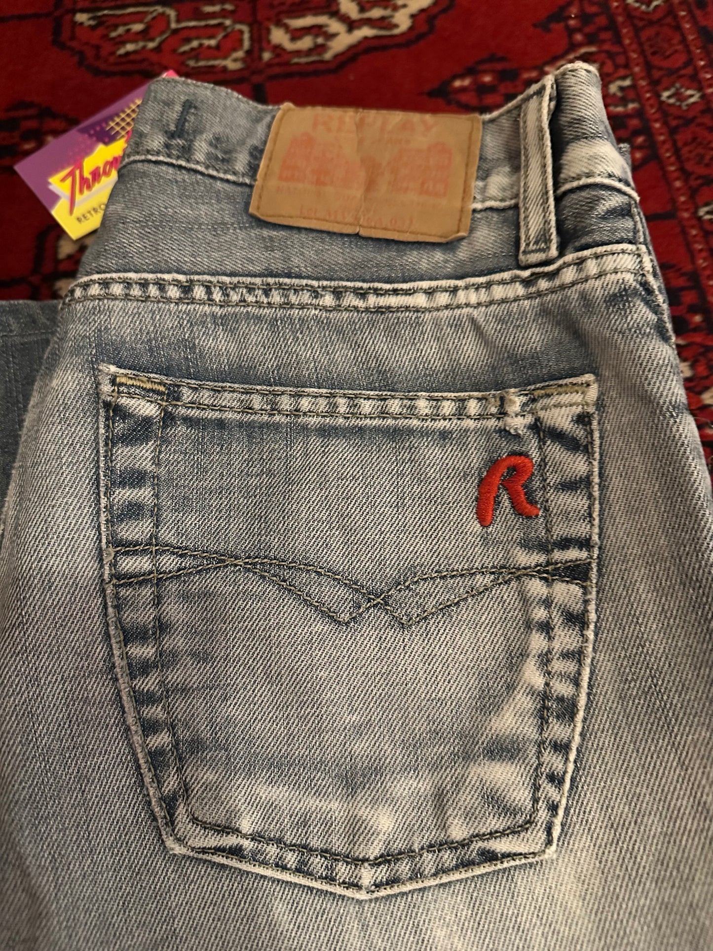 Vintage Y2K Replay distressed blue jeans. Waist 31”