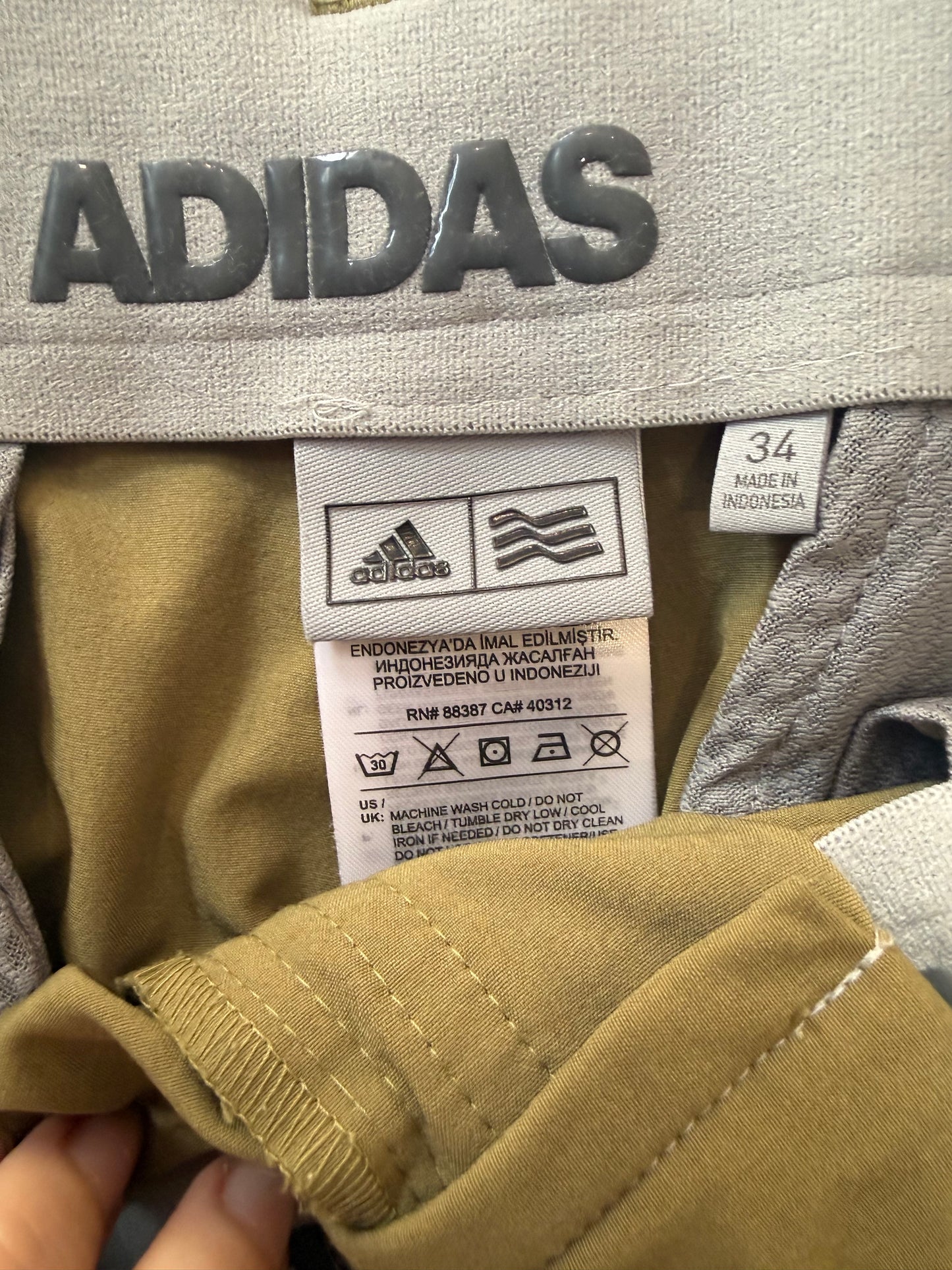 Adidas golf sports shorts. Size 34” waist. Khaki.