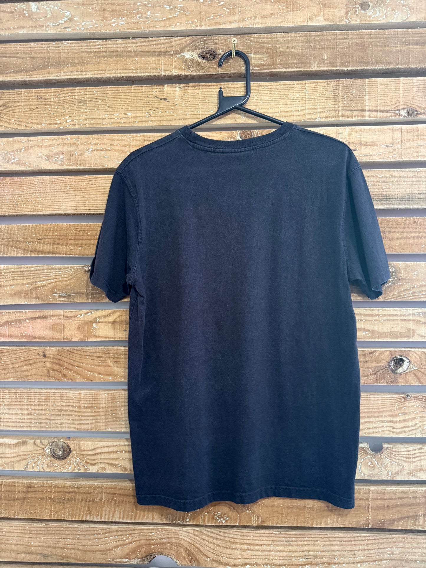 Vintage Y2K McKenzie print motif T-shirt. Black. Size Medium.