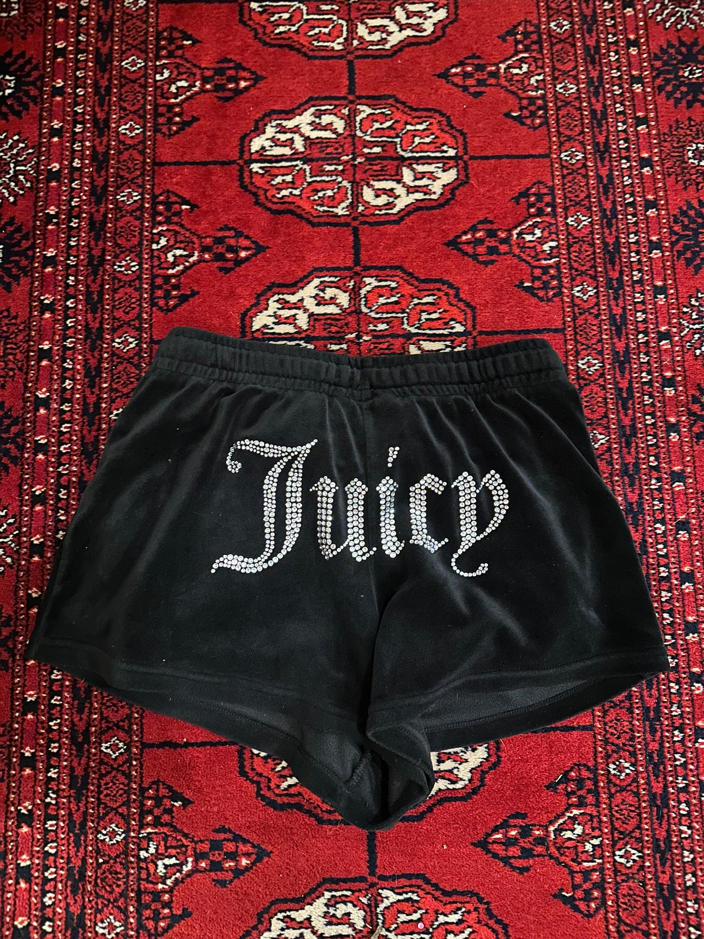 Vintage Y2K Juicy Couture velour black shorts. Spell-out rhinestone juicy back. Size Small.