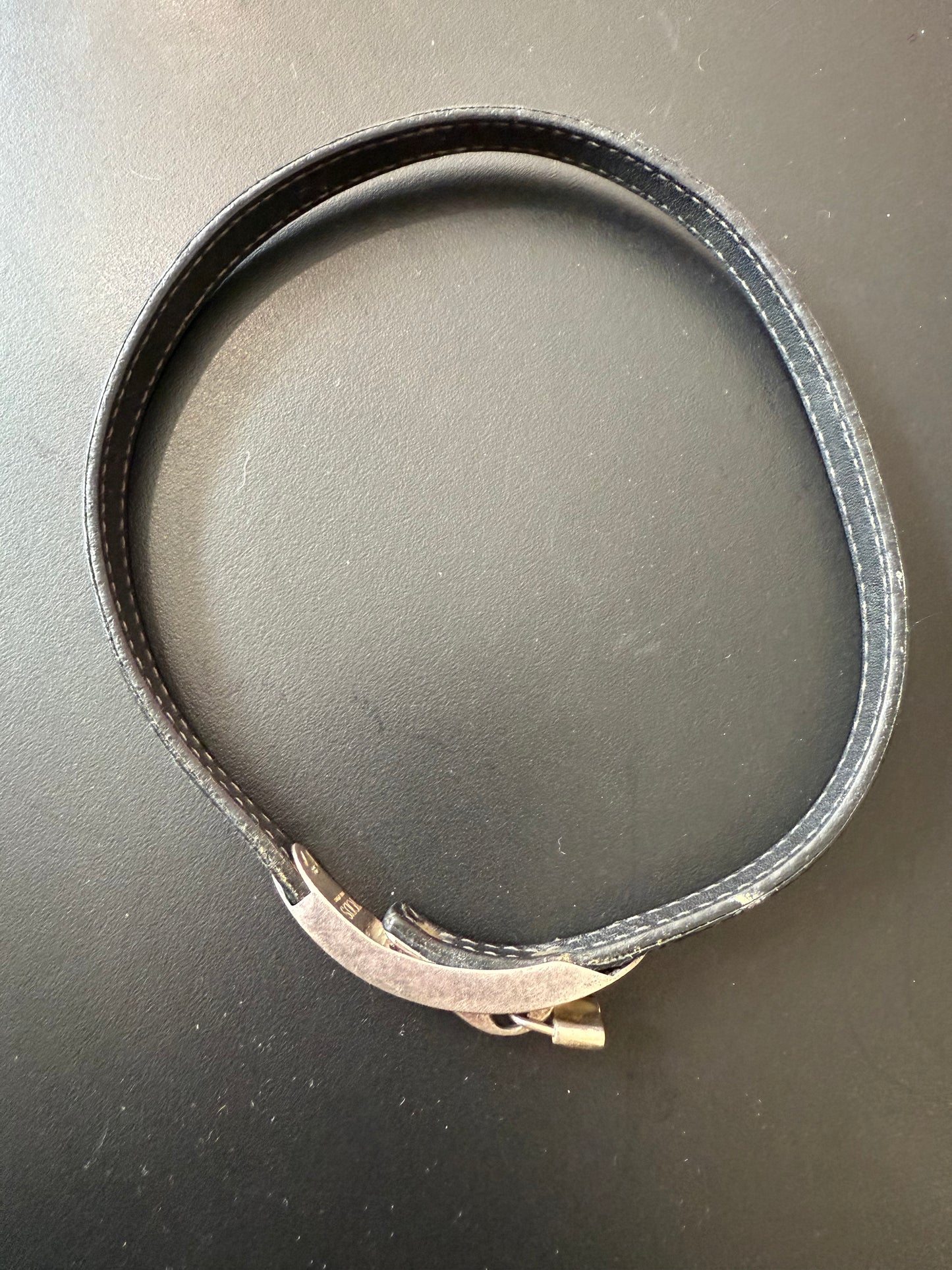Tod’s black leather buckle lock bracelet silver.