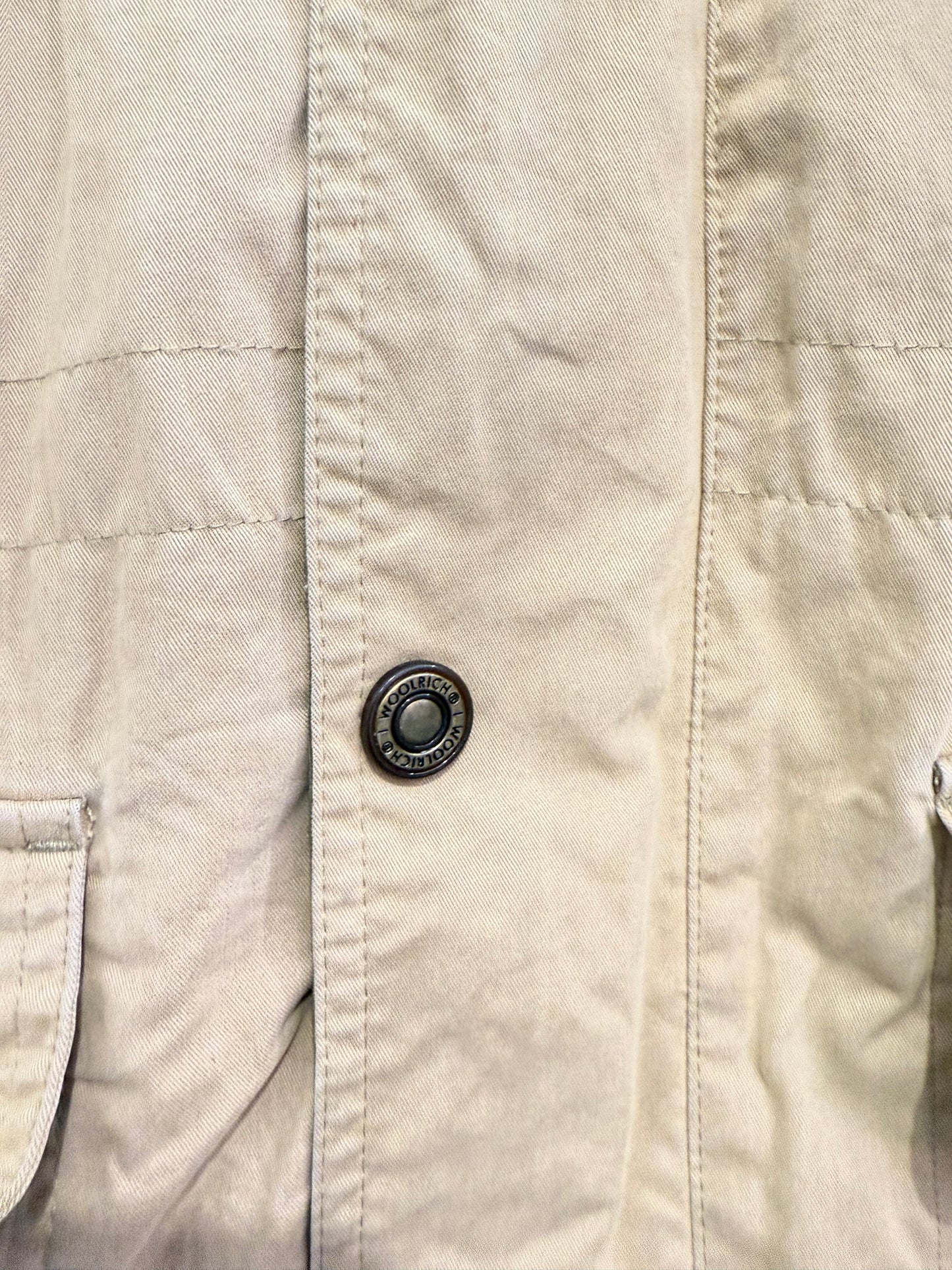 Vintage 90s Woolrich coat in beige. Plaid lined, leather collar. Size large.