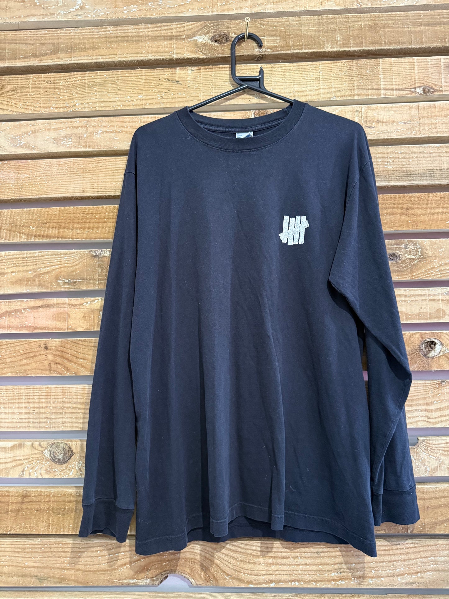 Undefeated printed black Sweater/ Sweatshirt. Size Medium.