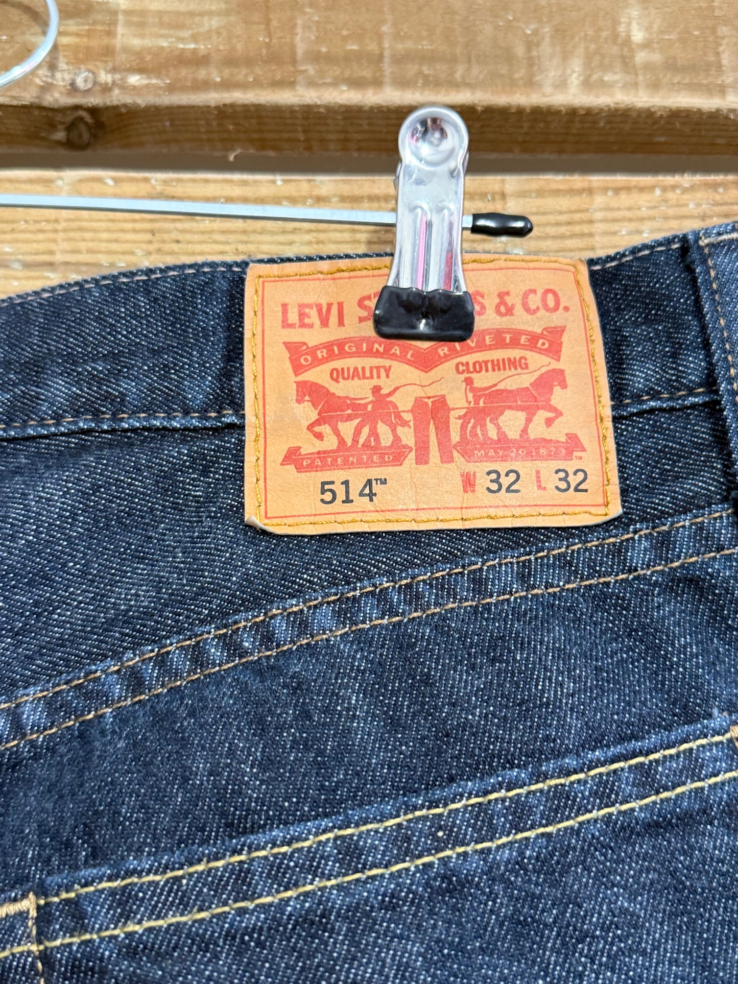 Vintage Y2K Levi’s denim dark wash blue shorts. 32” waist. Size 12.