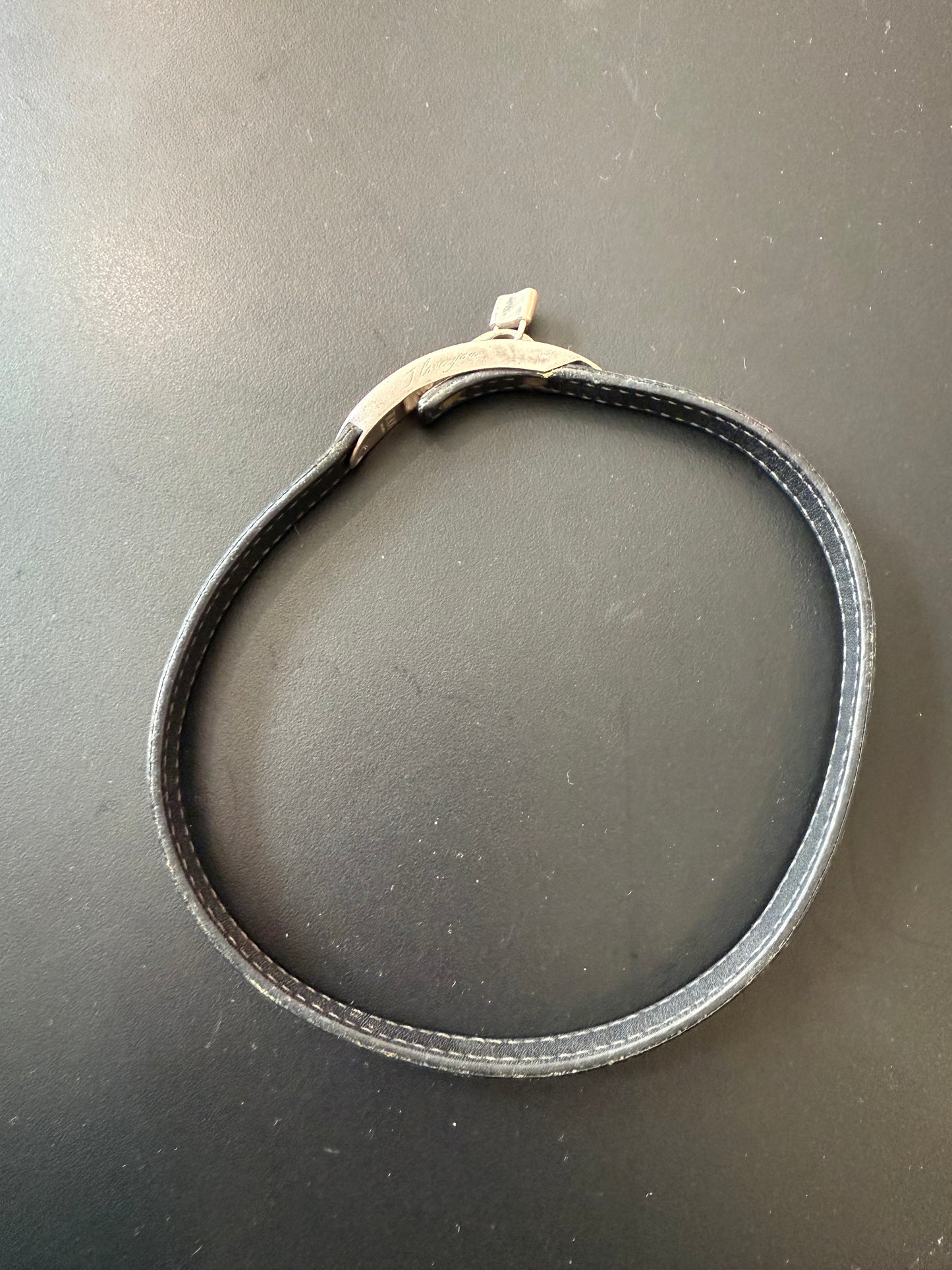 Tod’s black leather buckle lock bracelet silver.
