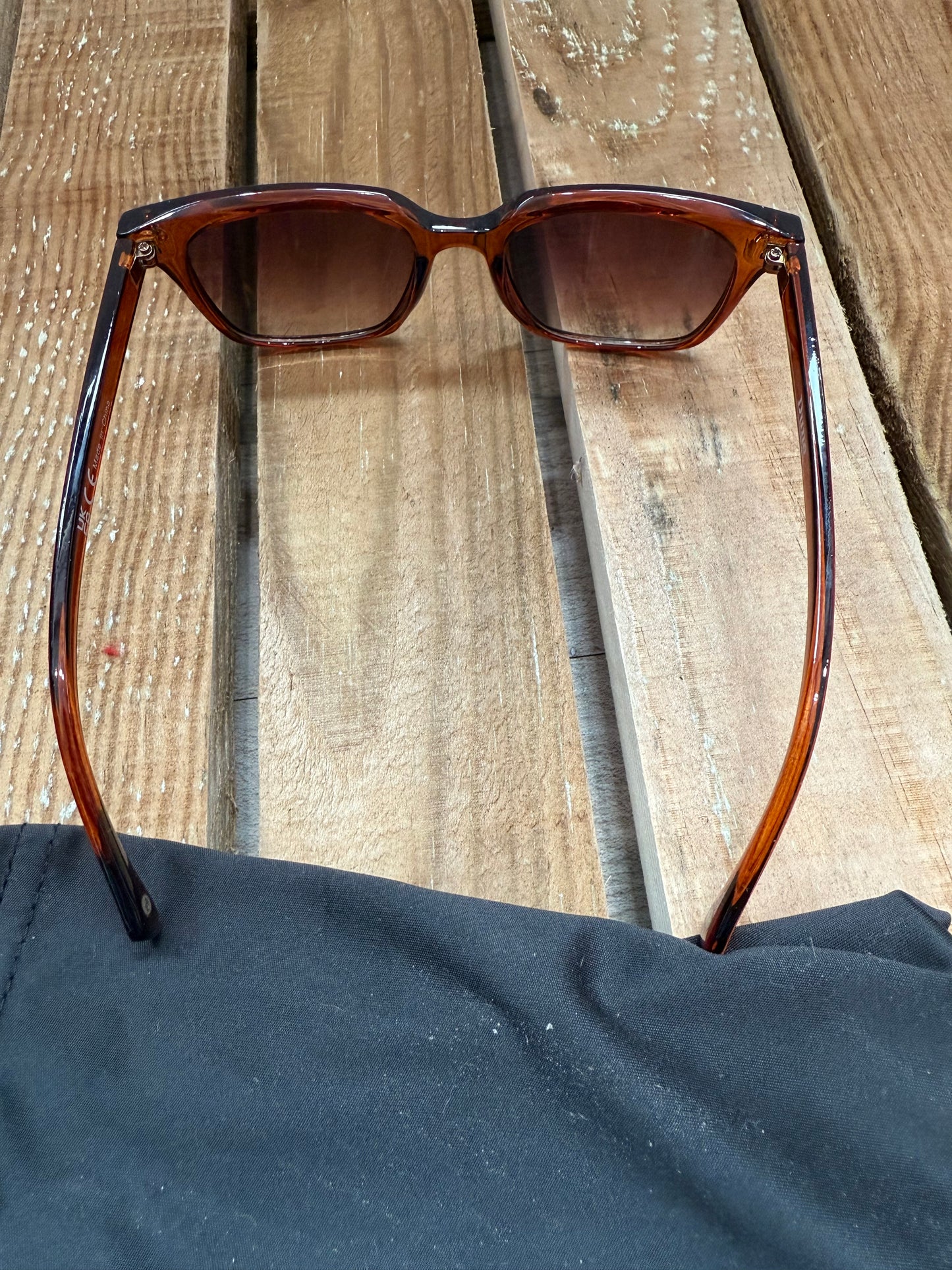 Dune brown sunglasses.