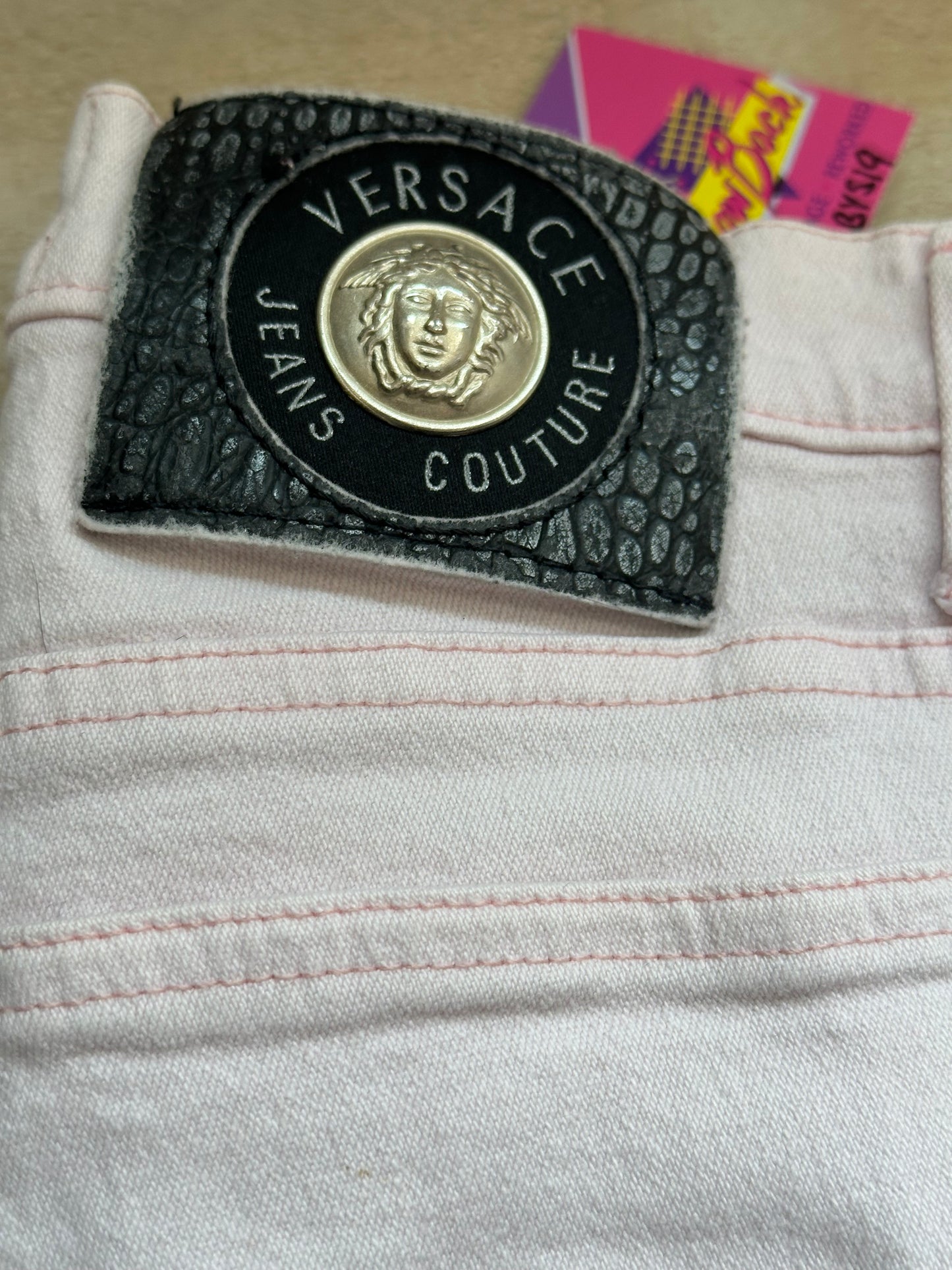 Vintage 90s Versace pink jeans. Medusa. 25” waist, 29.5” leg.