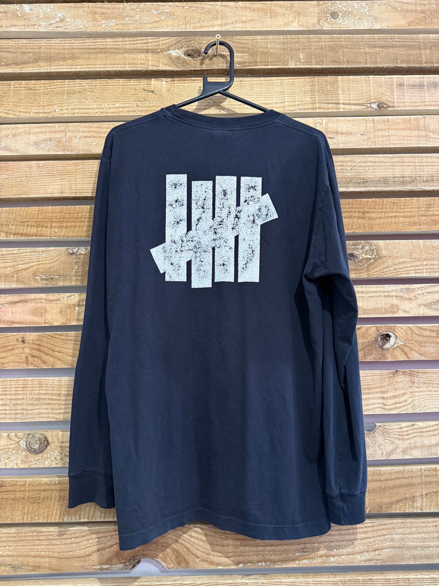 Undefeated printed black Sweater/ Sweatshirt. Size Medium.