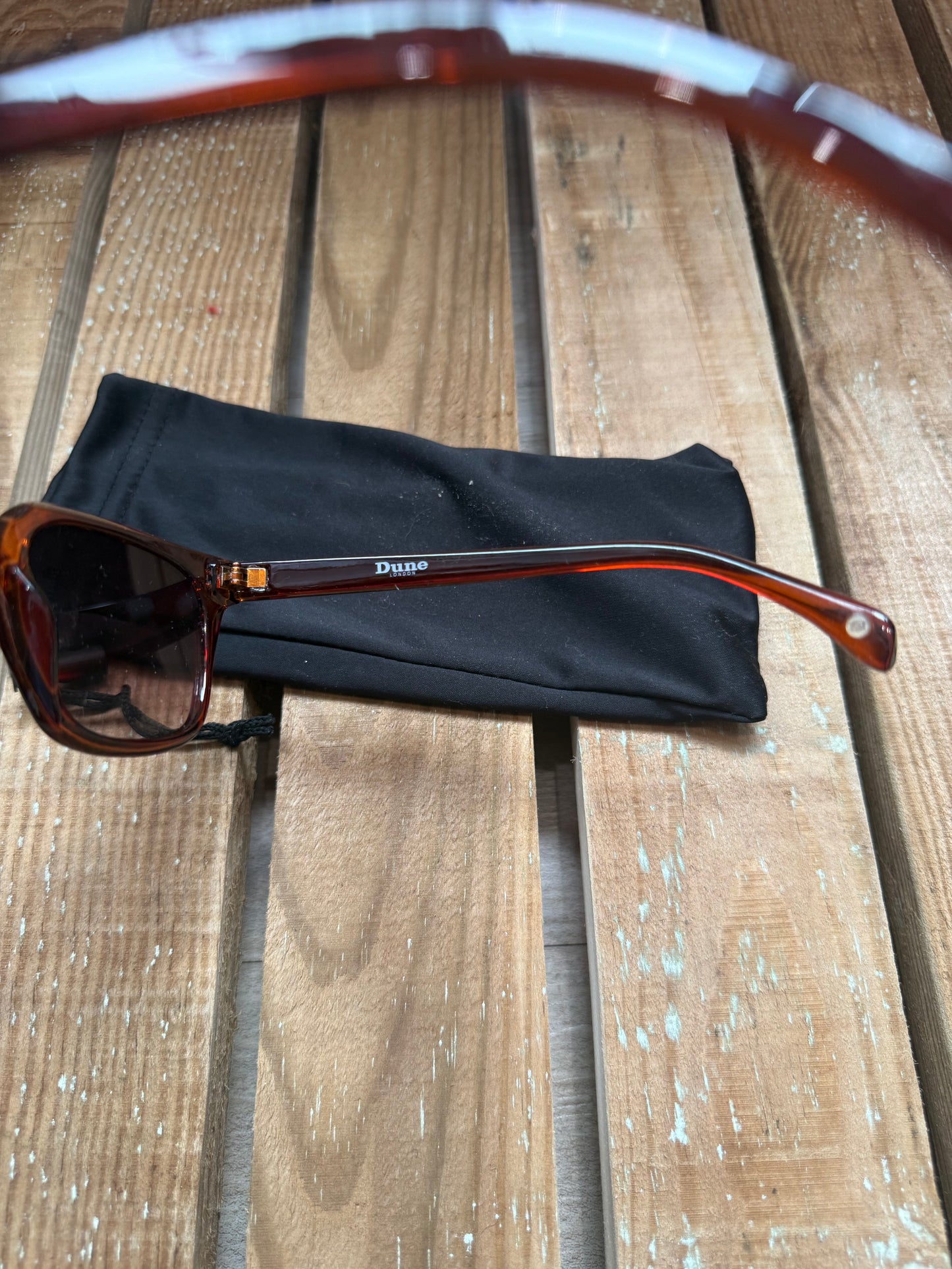 Dune brown sunglasses.