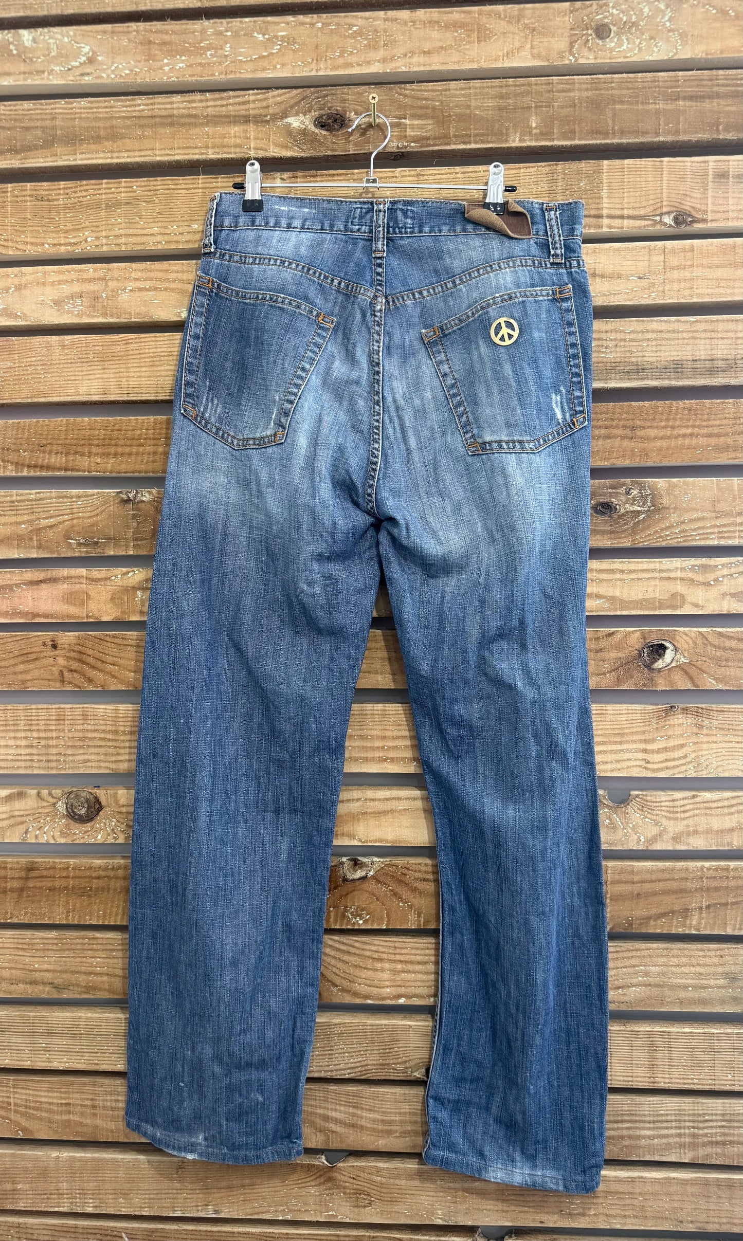 Vintage 90s Moschino Blue - Peace sign jeans. Waist 34” leg 30”
