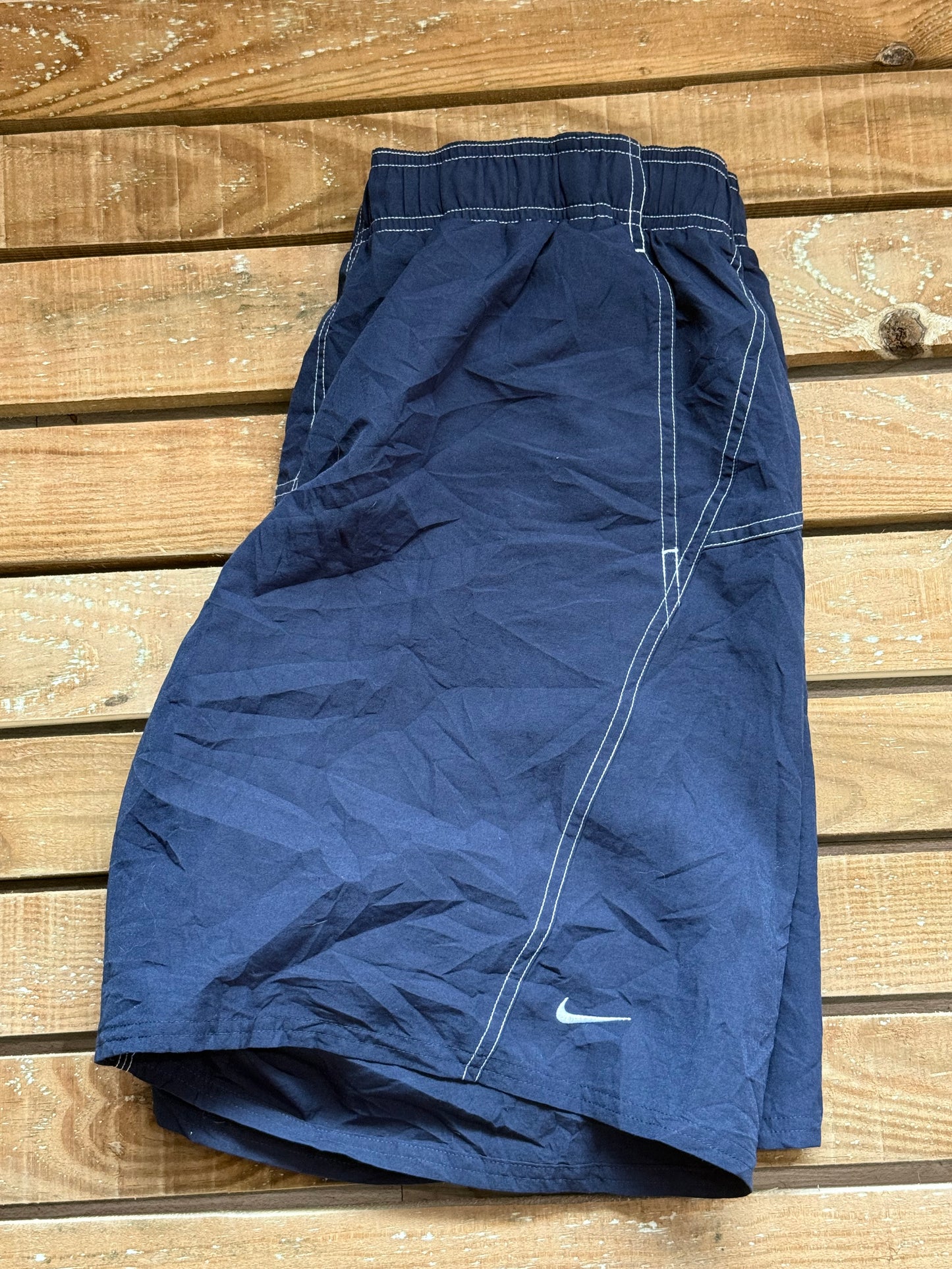 Vintage 90s Nike spell-out sports shorts. 34”-38” waist. Size XL.