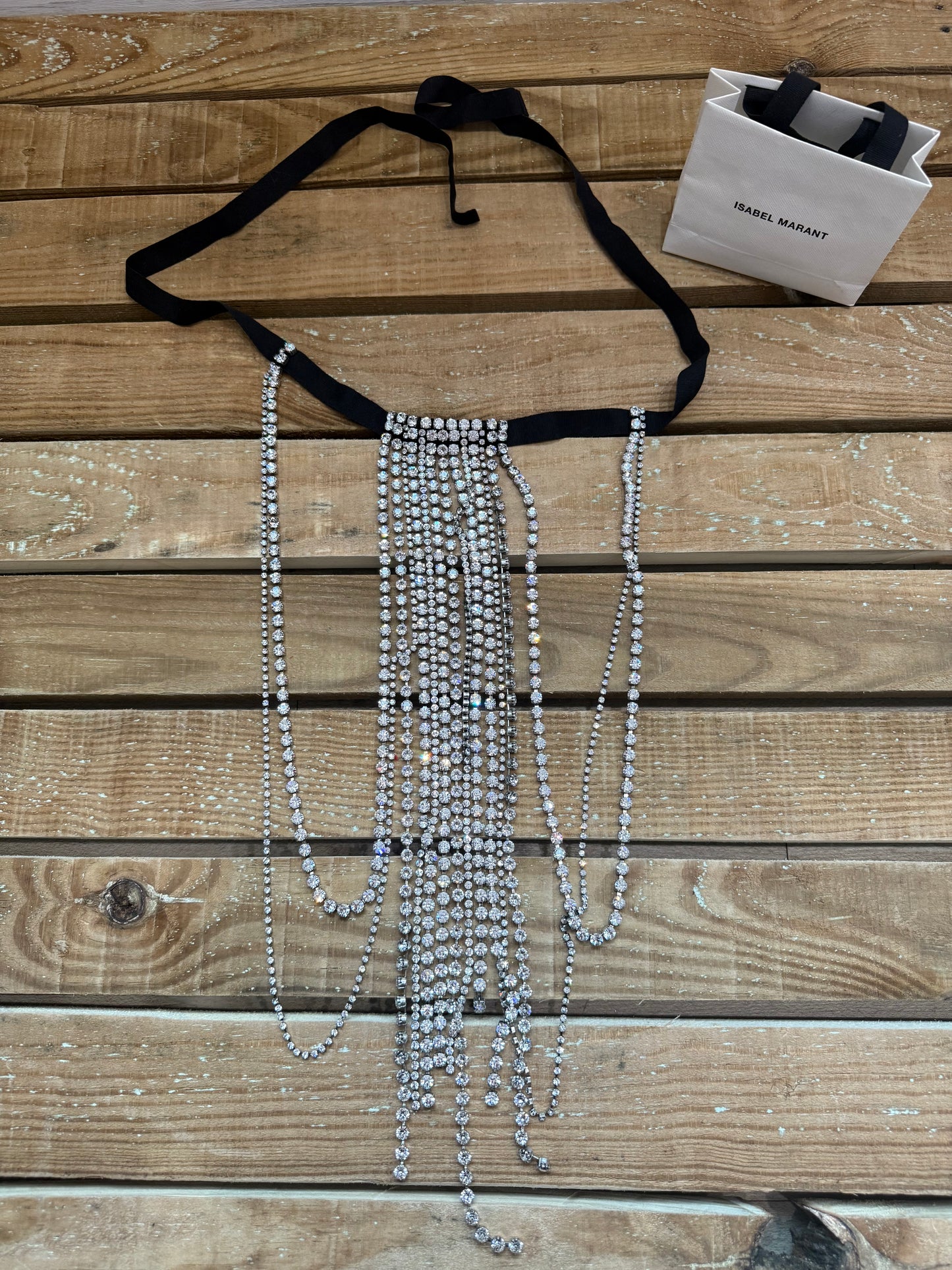 Isabel Marant crystal-embellished fringe choker necklace with bag.