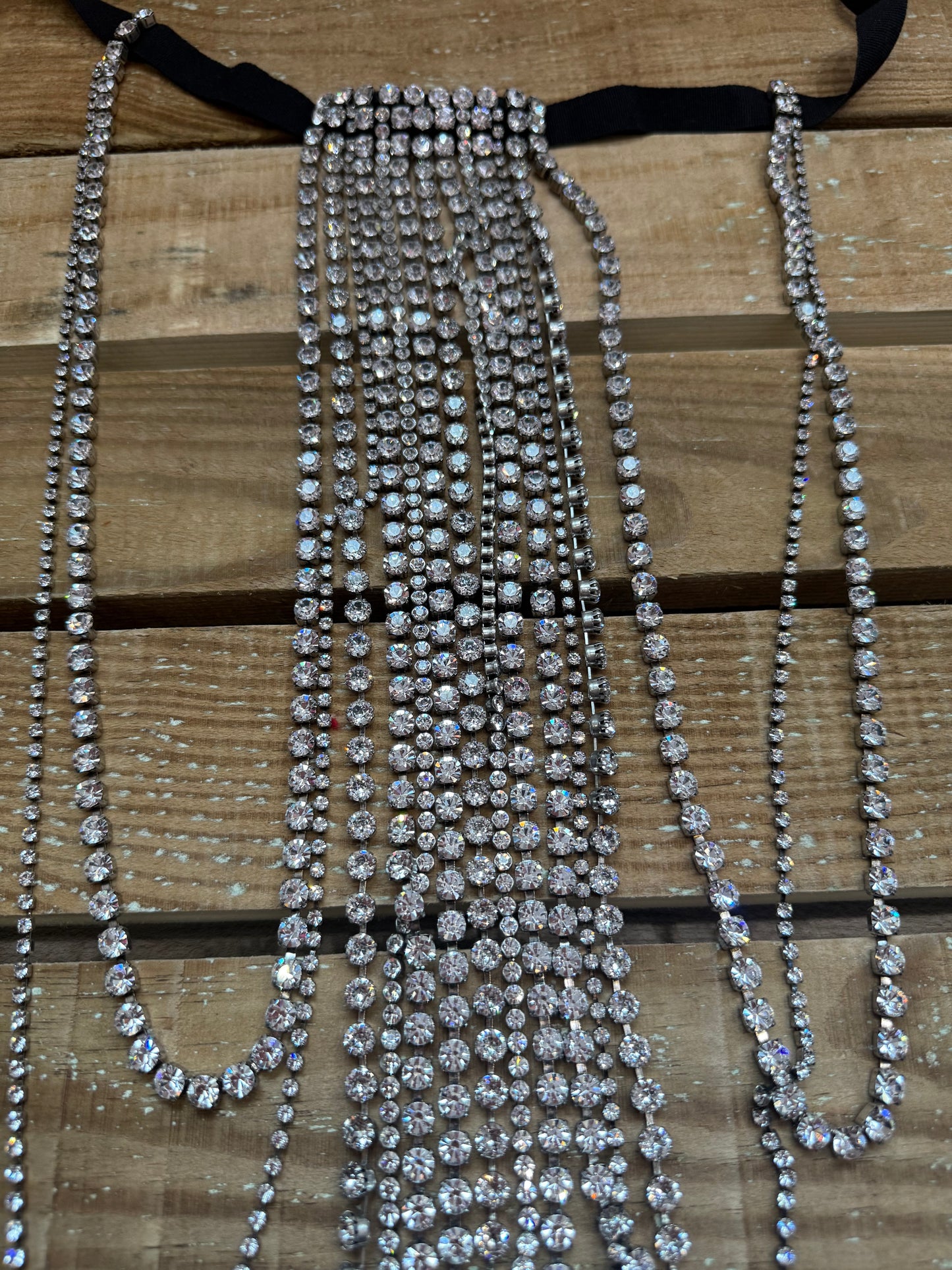 Isabel Marant crystal-embellished fringe choker necklace with bag.