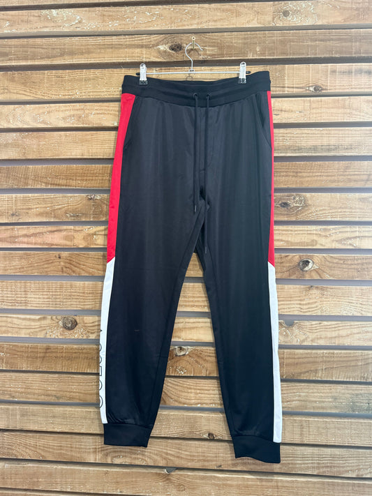 Guess spell-out Joggers/ Track pants. Black. Medium. 33” waist.