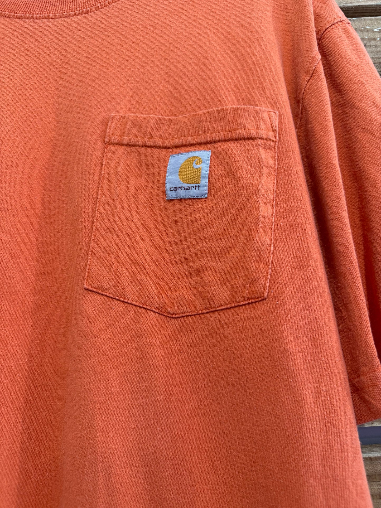 Carhartt logo pocket t-shirt. Orange. Workwear/ cowboy/ USA. Size Medium.