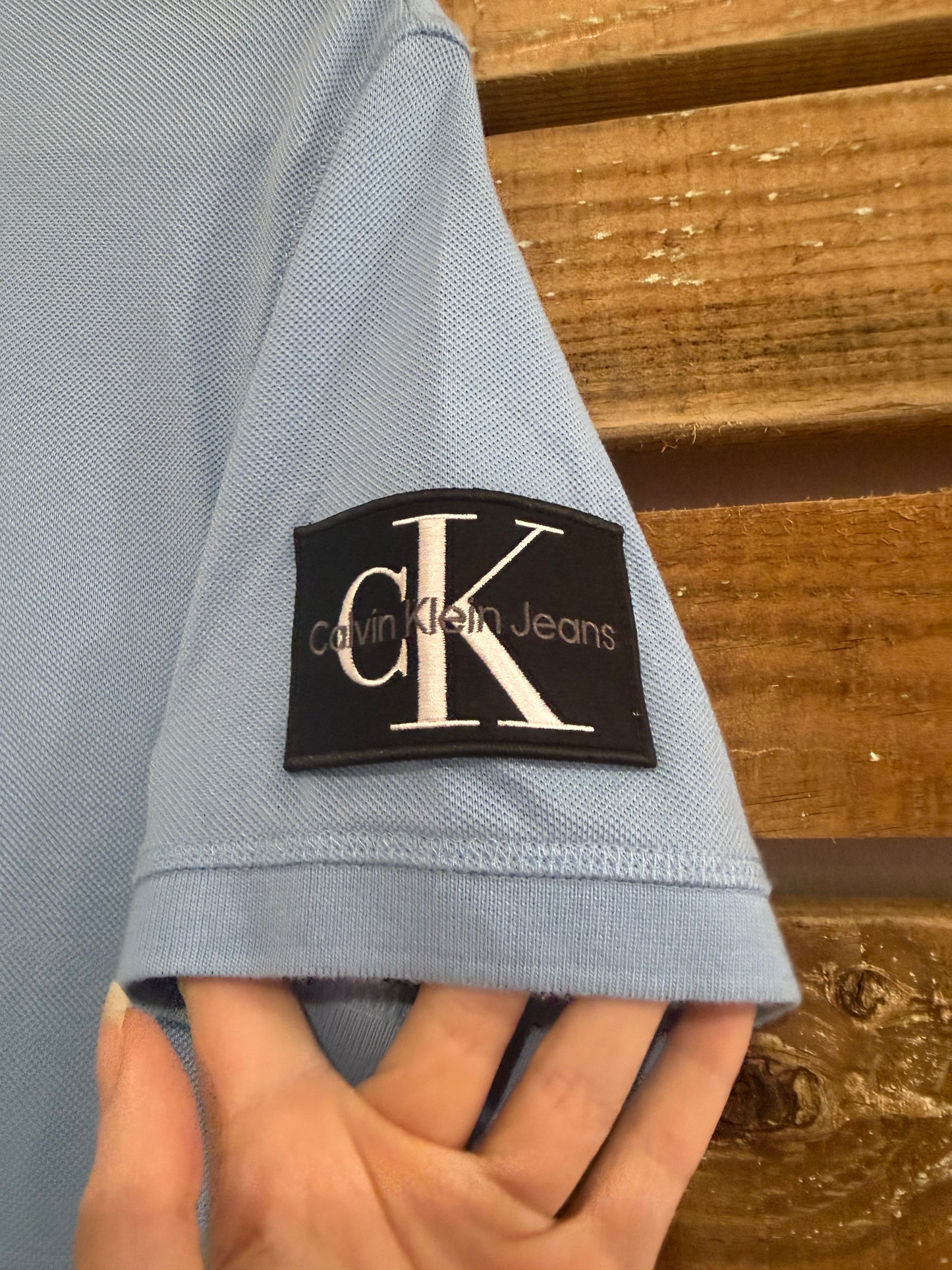 Vintage Y2K Calvin Klein polo shirt. Blue. Size XS. 36” chest.