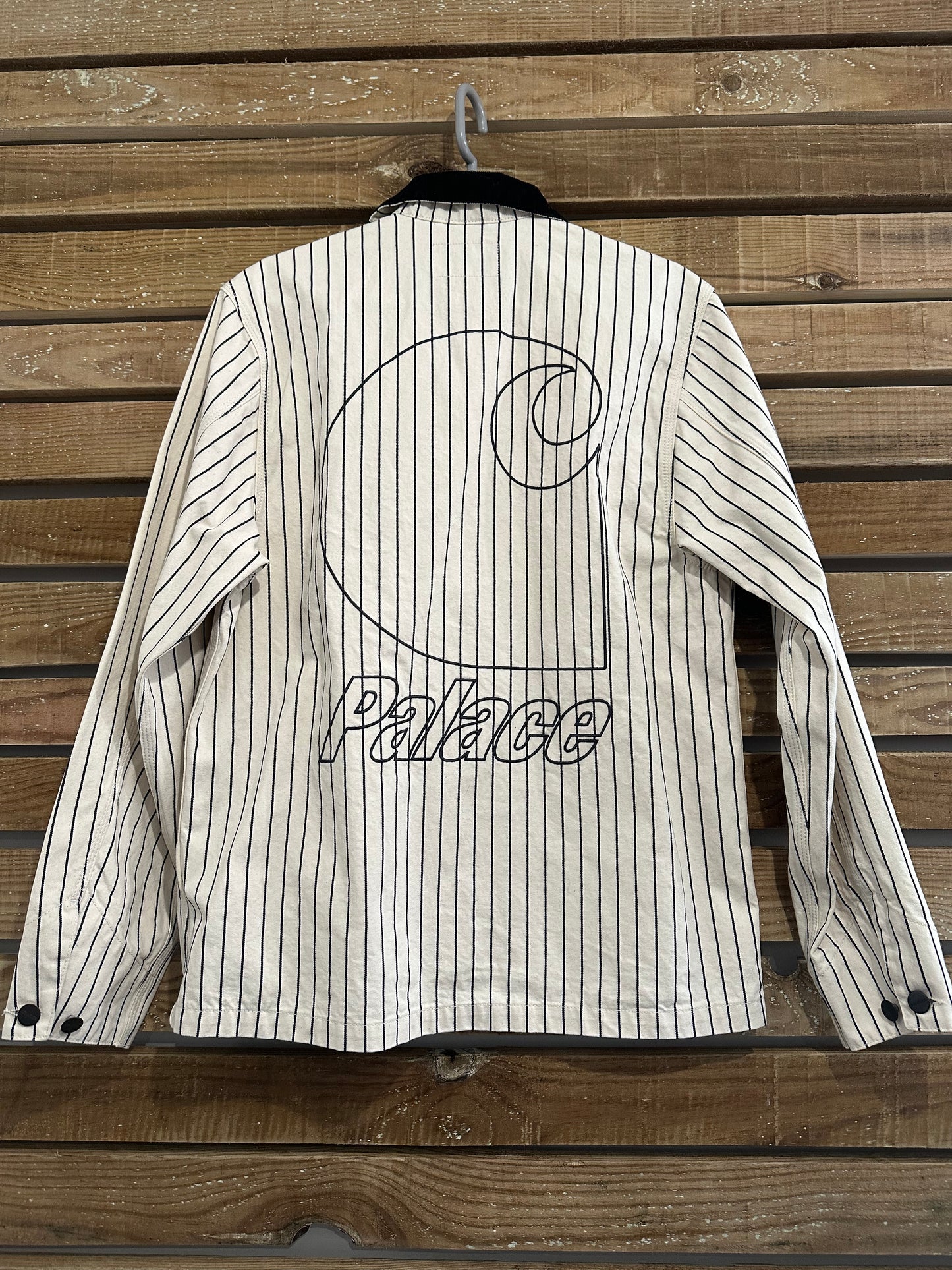 Brand new without tag Carhartt WIP x Palace Michigan Coat. “hickory wax/ Black” size medium.