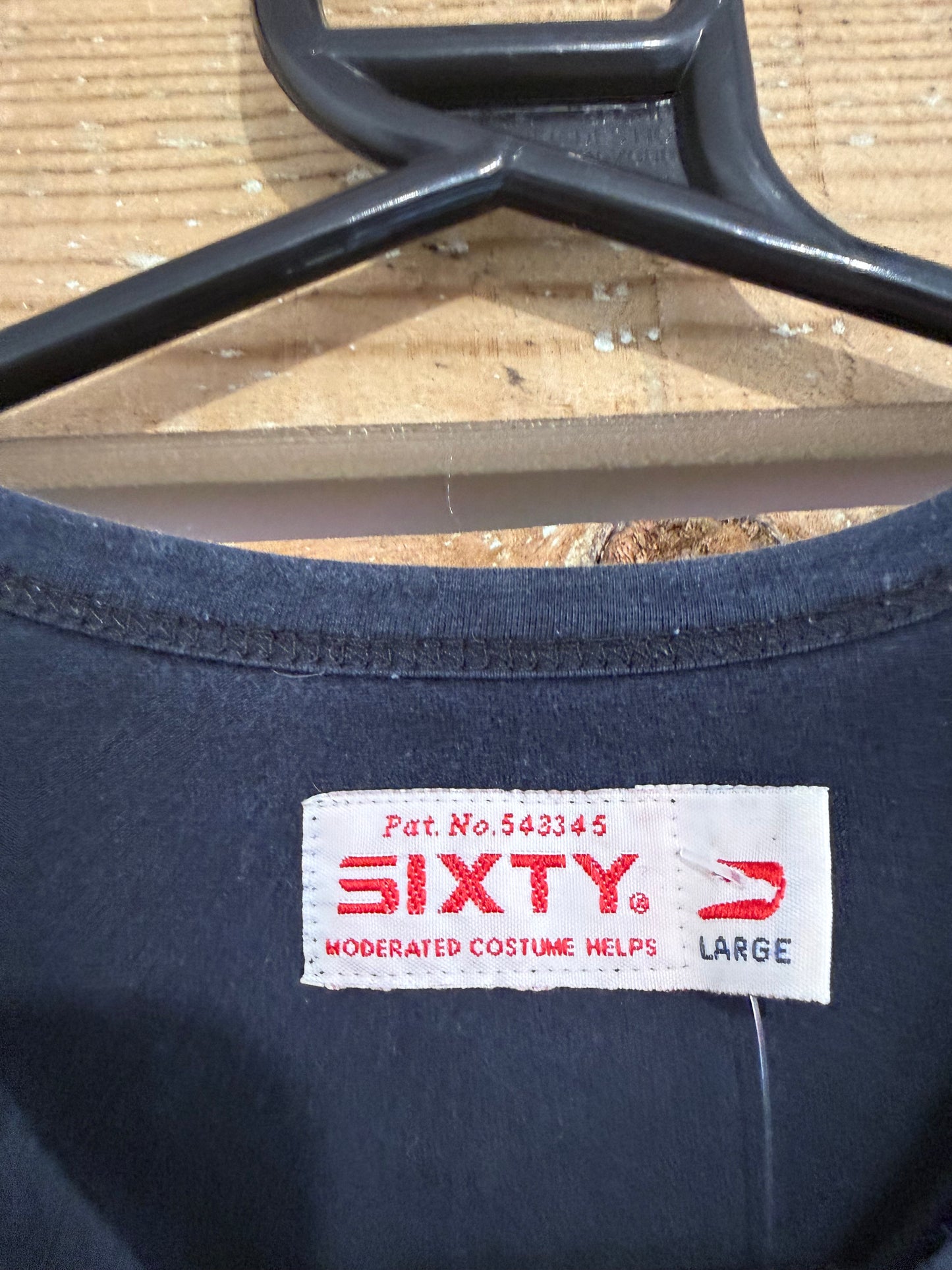 Vintage Y2K Sixty Tribal motif T-shirt. Size Large.