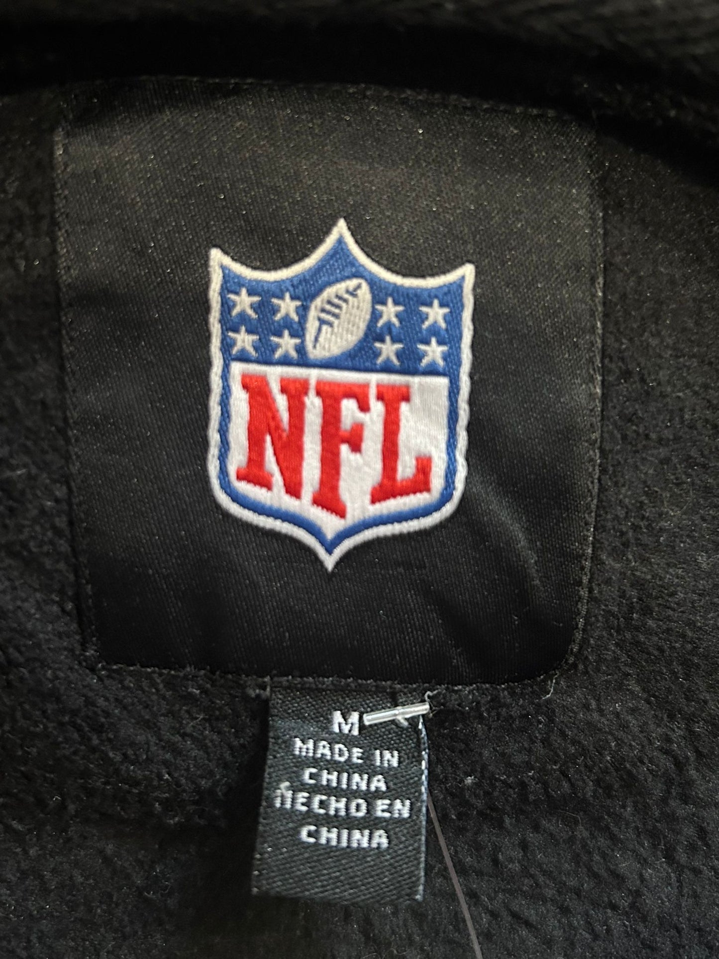 Vintage Y2K NFL Raiders spell-out zip up fleece jacket. Black. Size Medium.