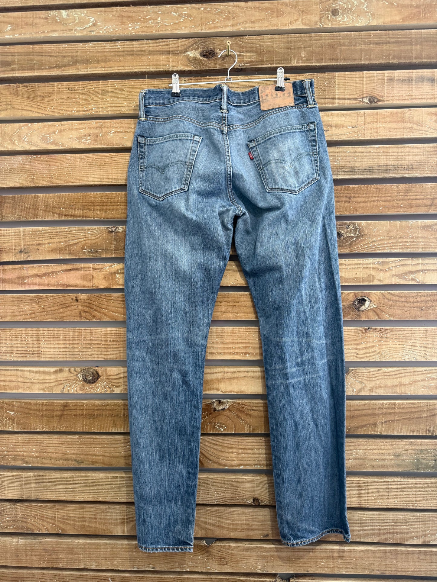 Vintage 90s Levi’s Dark Blue distressed stonewash jeans. Waist 34” leg 32”