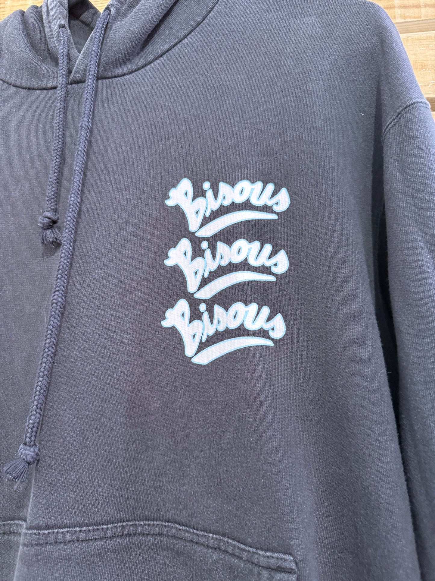 Bisous Skateboard hoodie/ hooded sweater. Black. Size Medium.