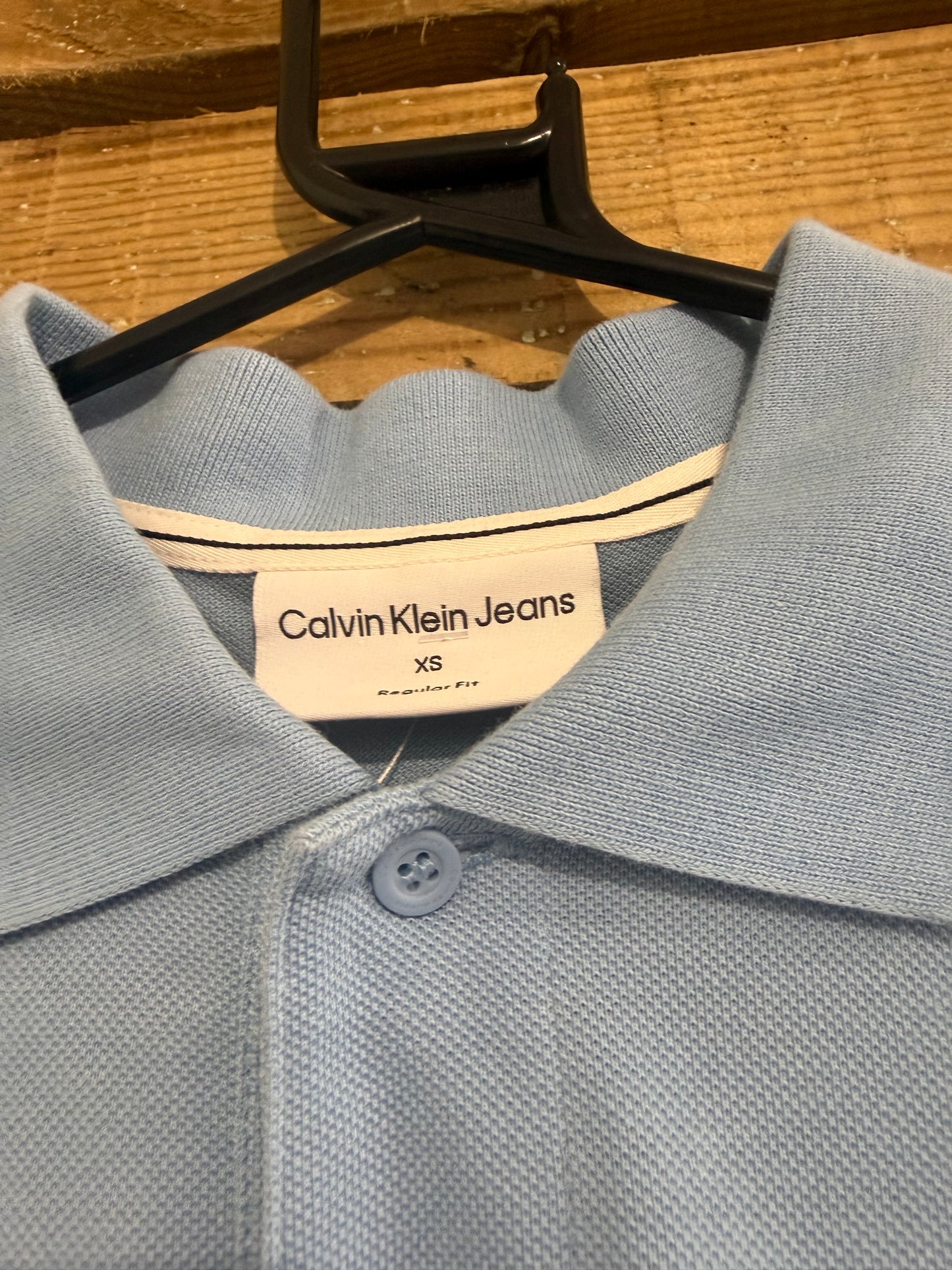 Vintage Y2K Calvin Klein polo shirt. Blue. Size XS. 36” chest.