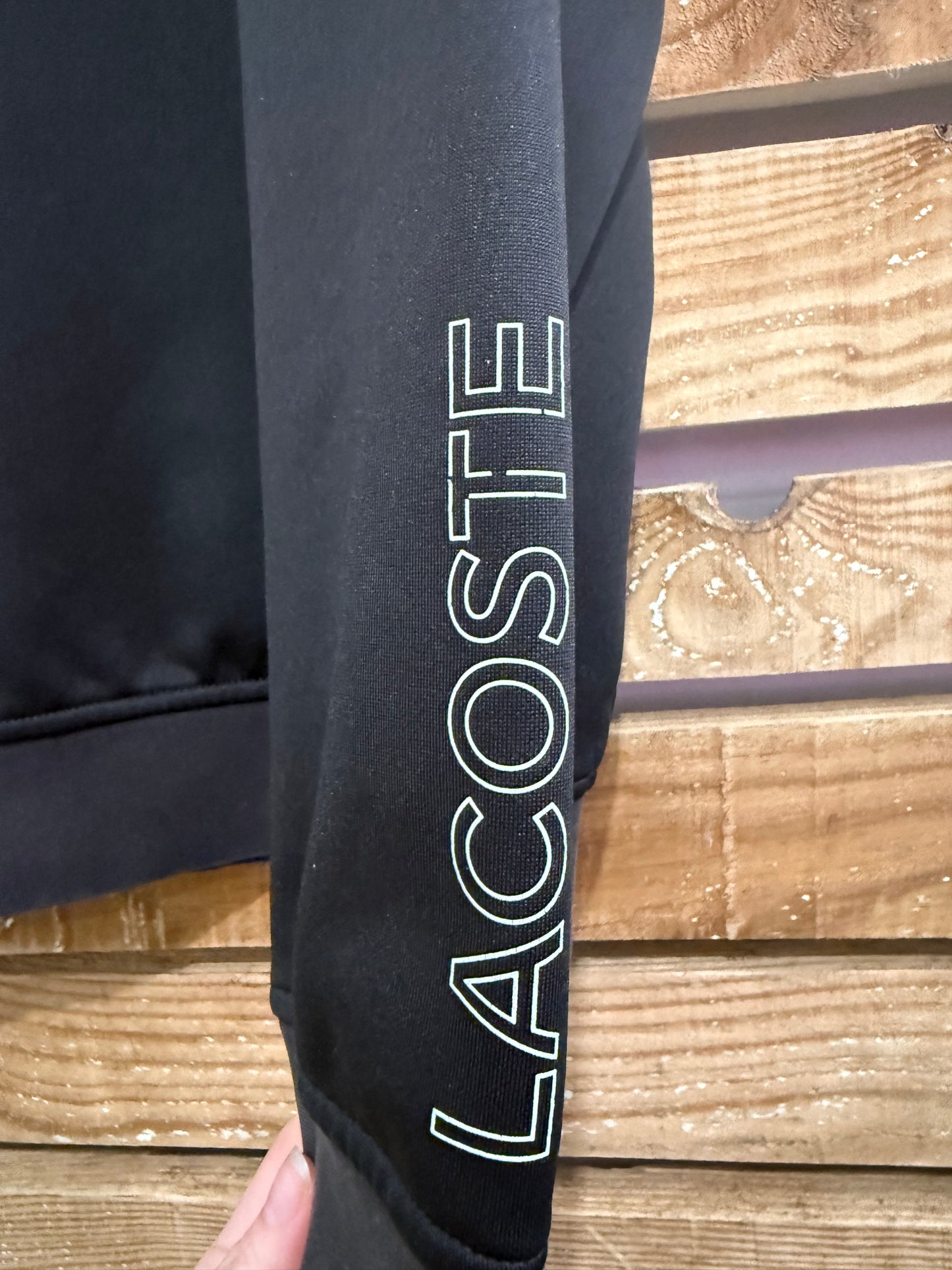 Lacoste spell-out logo sweater/sweatshirt. Size XL. Black.