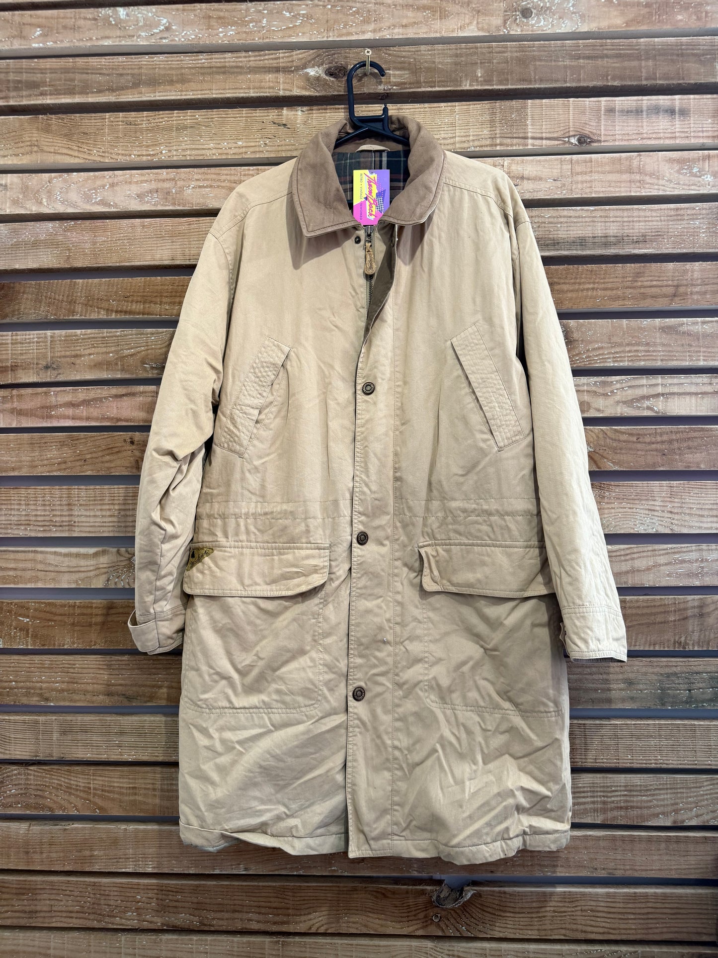 Vintage 90s Woolrich coat in beige. Plaid lined, leather collar. Size large.