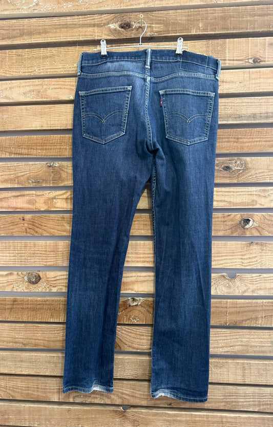 Vintage 90s Levi’s Dark Blue distressed jeans. Waist 32” leg 30”