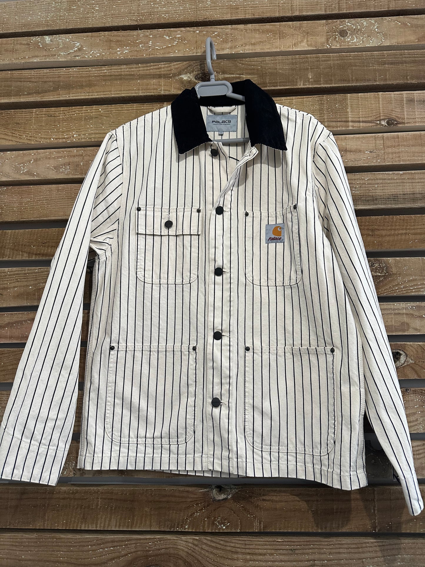 Brand new without tag Carhartt WIP x Palace Michigan Coat. “hickory wax/ Black” size medium.