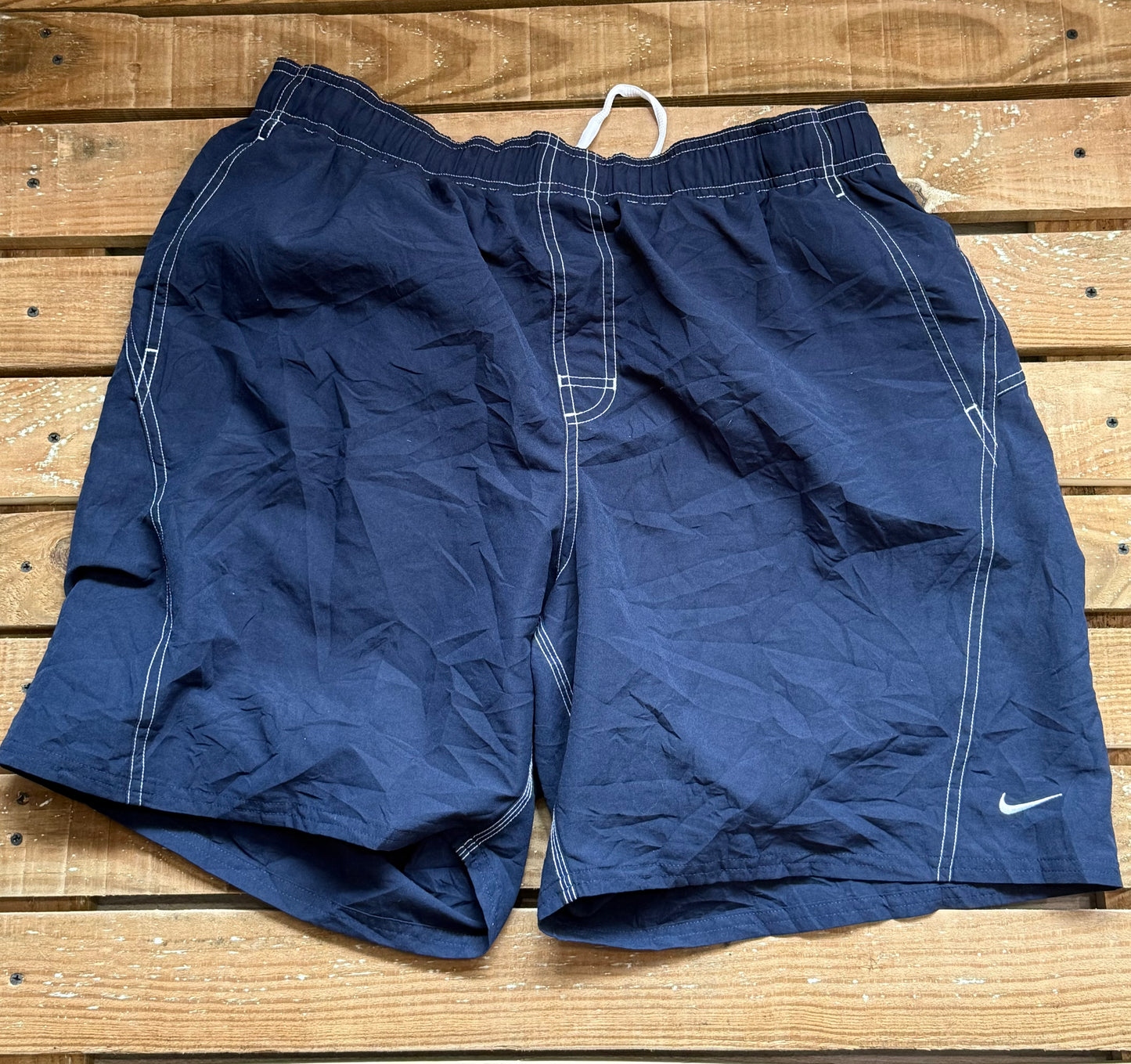 Vintage 90s Nike spell-out sports shorts. 34”-38” waist. Size XL.