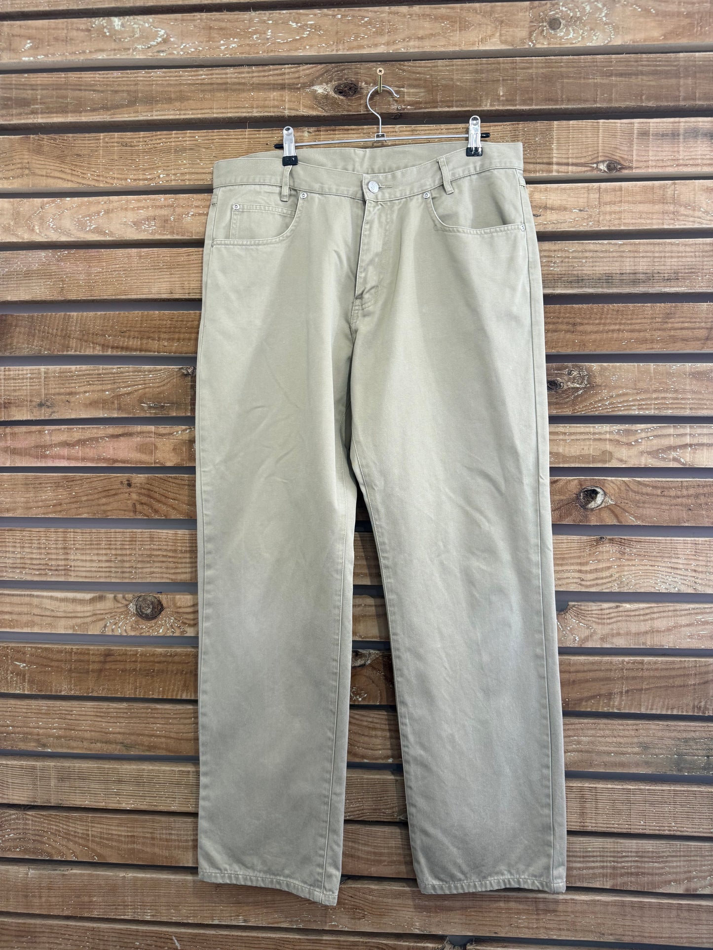 Vintage 90s Yves Saint Laurent (YSL) beige pants/ trousers. Jean style. 36” waist, 31.5” leg.