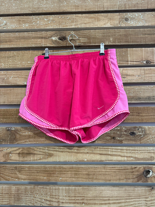 Nike dri-fit sports runner shorts. Pink gingham. 30-36” waist. Size Medium.