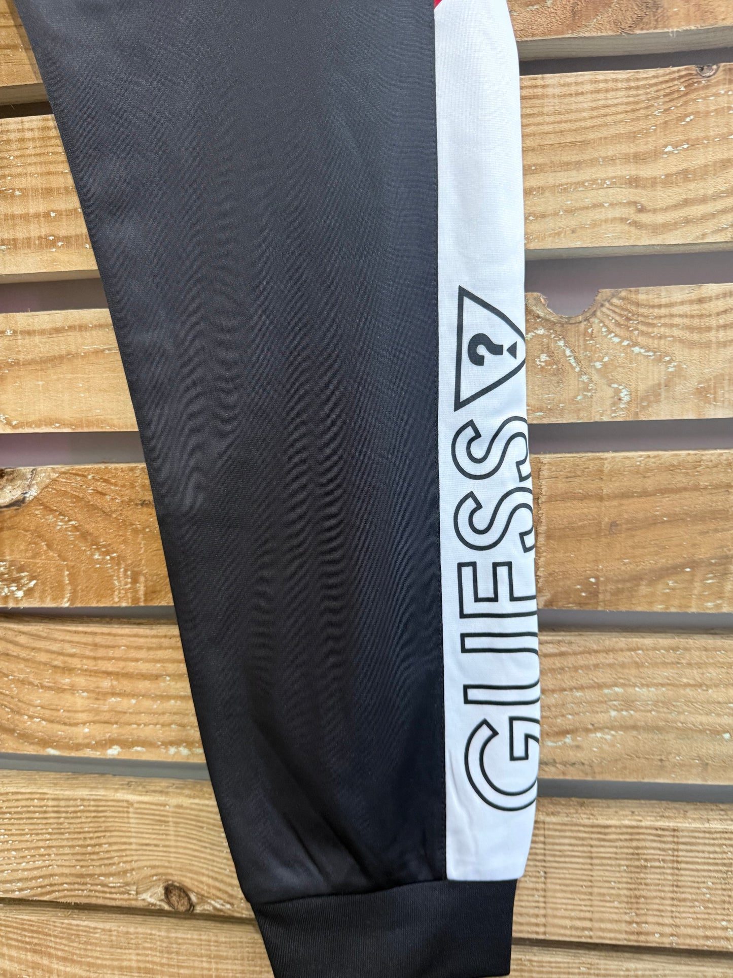 Guess spell-out Joggers/ Track pants. Black. Medium. 33” waist.