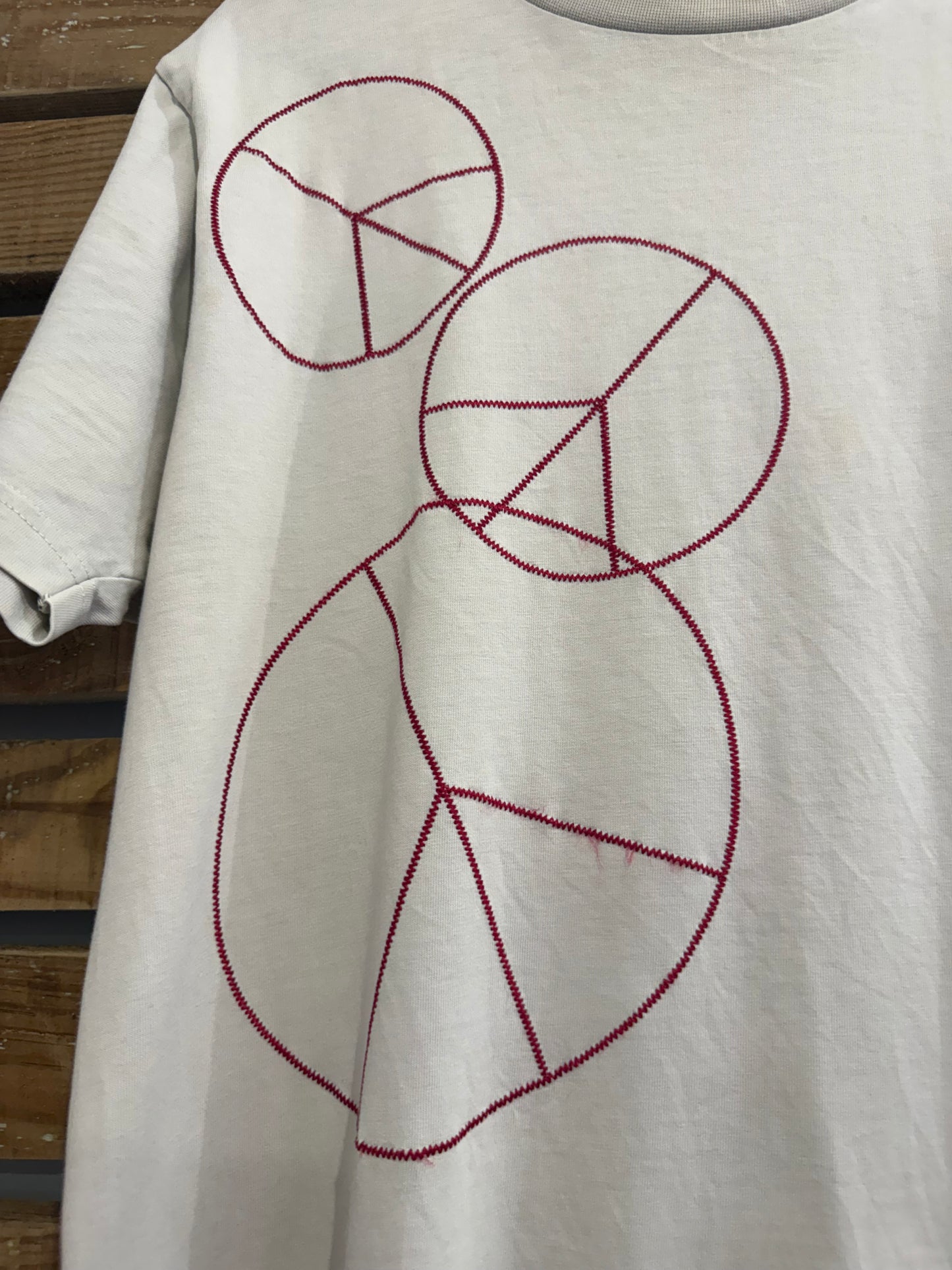 Vintage 90s Moschino peace logo embroidered T-shirt. Size Large. Rave