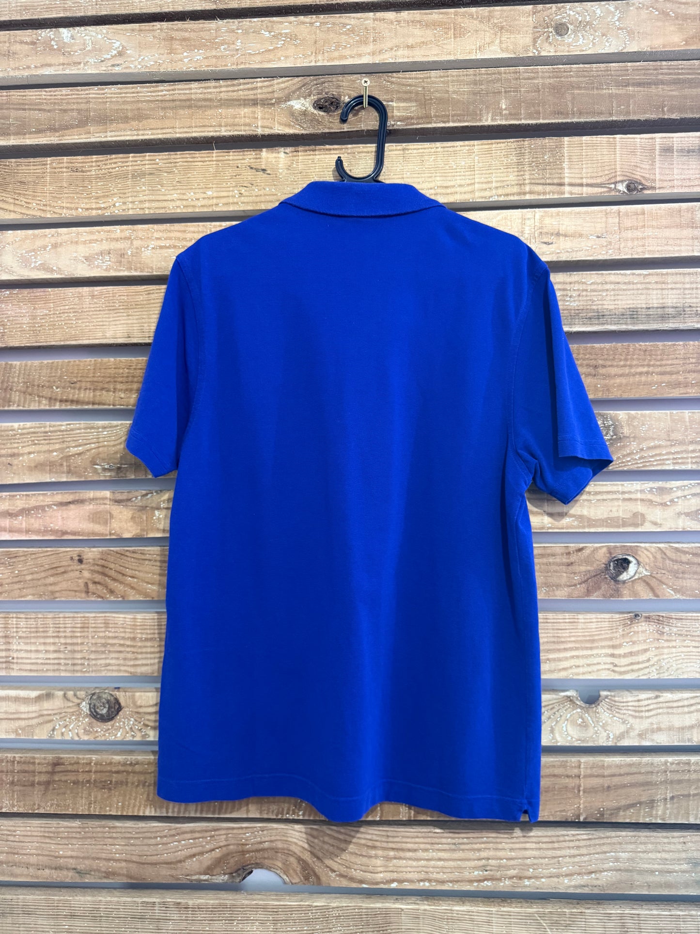 Vintage 90s Lacoste polo shirt. Blue. Size Medium. 44” chest.
