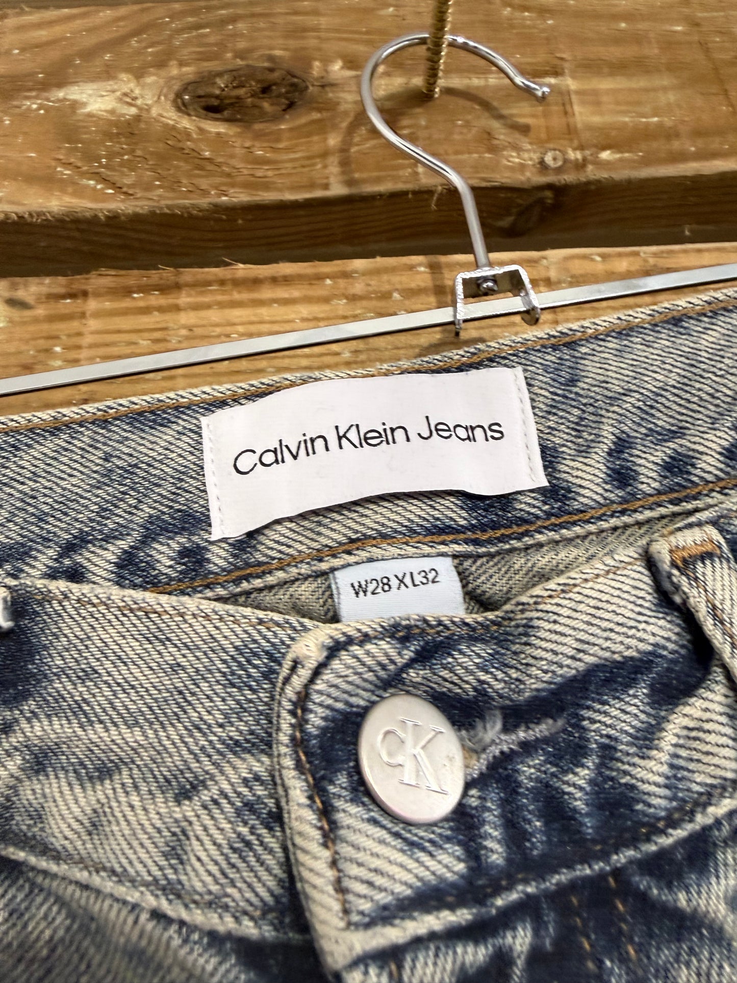 Calvin Klein acid wash straight leg jeans. Waist 30” leg 32”