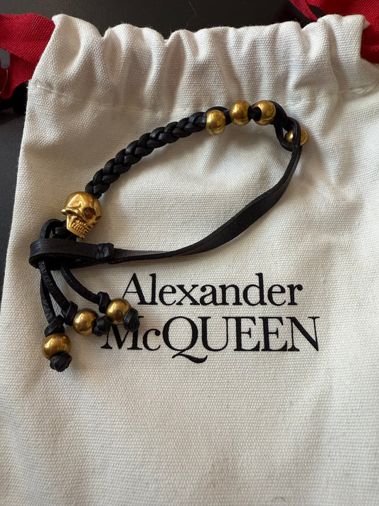 ALEXANDER MCQUEEN BLACK Leather and Swarovski crystal skull bracelet Gold with dust bag.