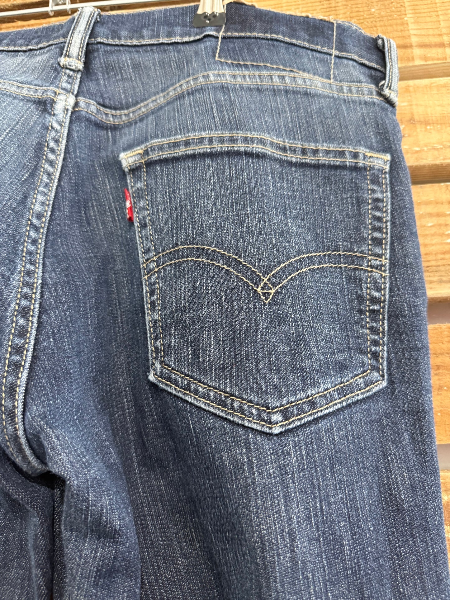 Vintage 90s Levi’s Dark Blue distressed jeans. Waist 32” leg 30”