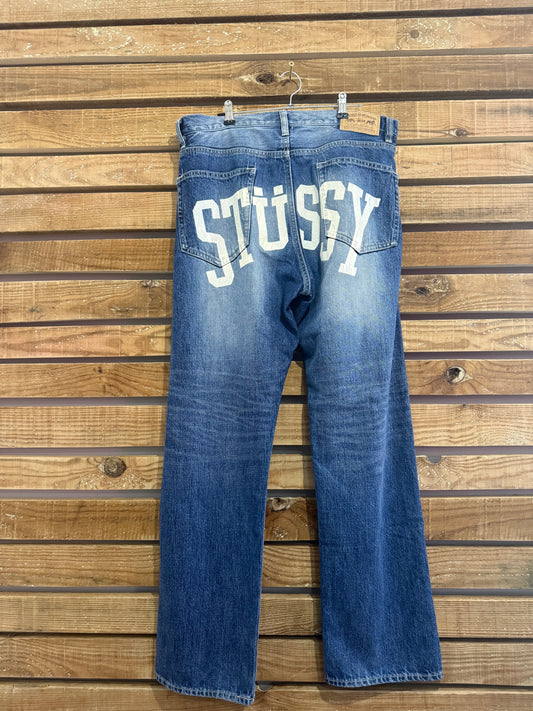 Vintage RARE Y2K Stüssy spell-out Jeans. Blue. 36” waist, 30” leg.