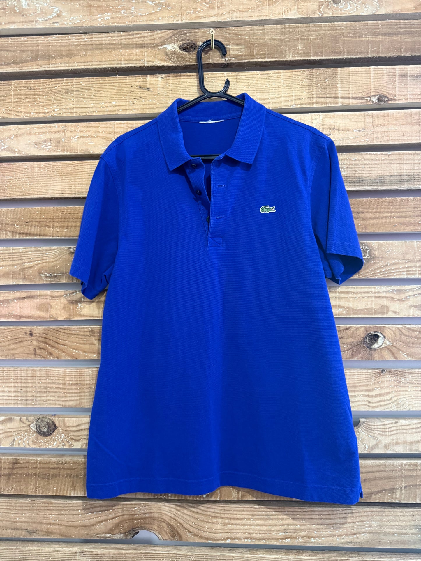Vintage 90s Lacoste polo shirt. Blue. Size Medium. 44” chest.