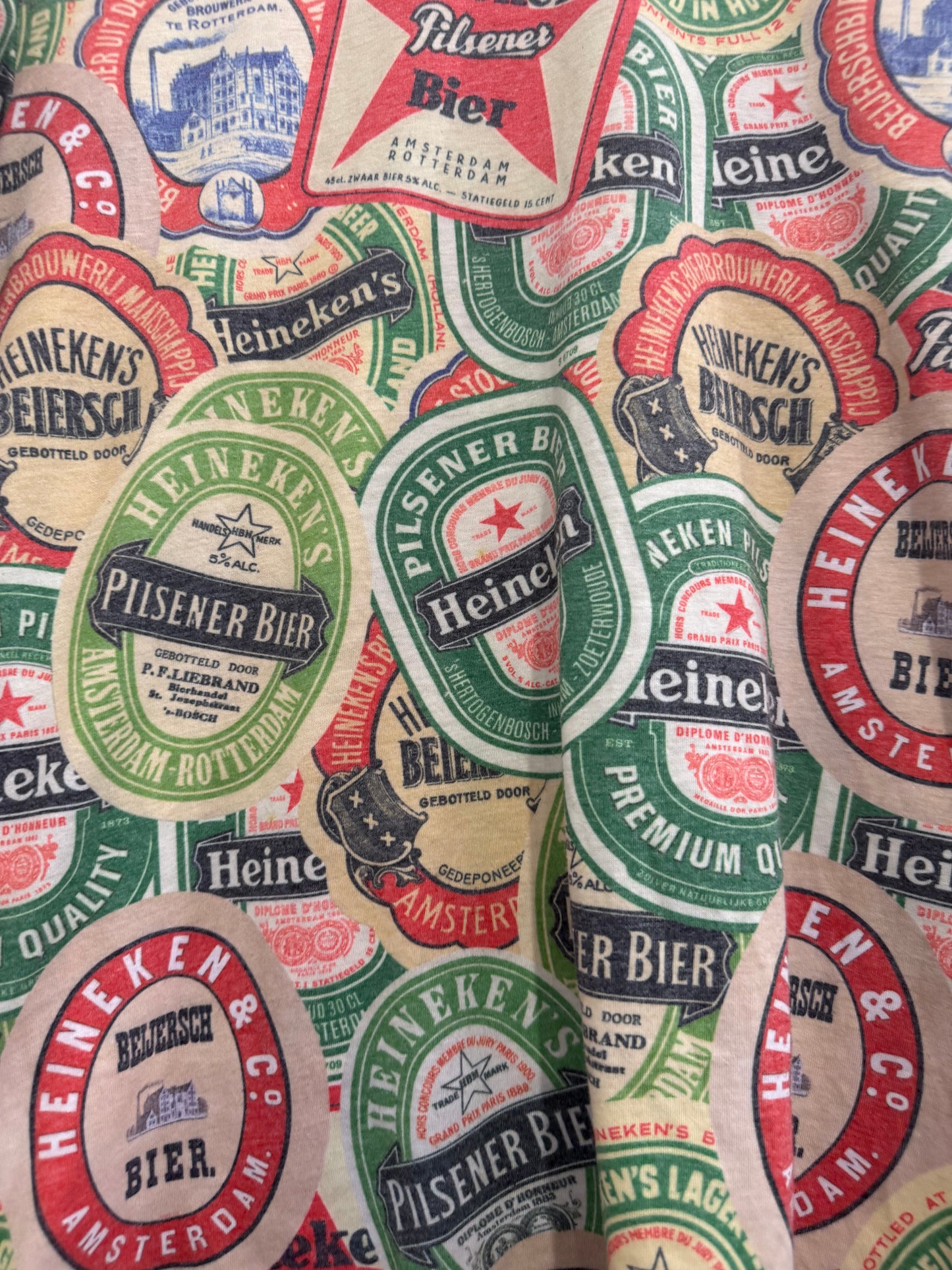 Vintage 90s Heineken print motif T-shirt. Size Small.