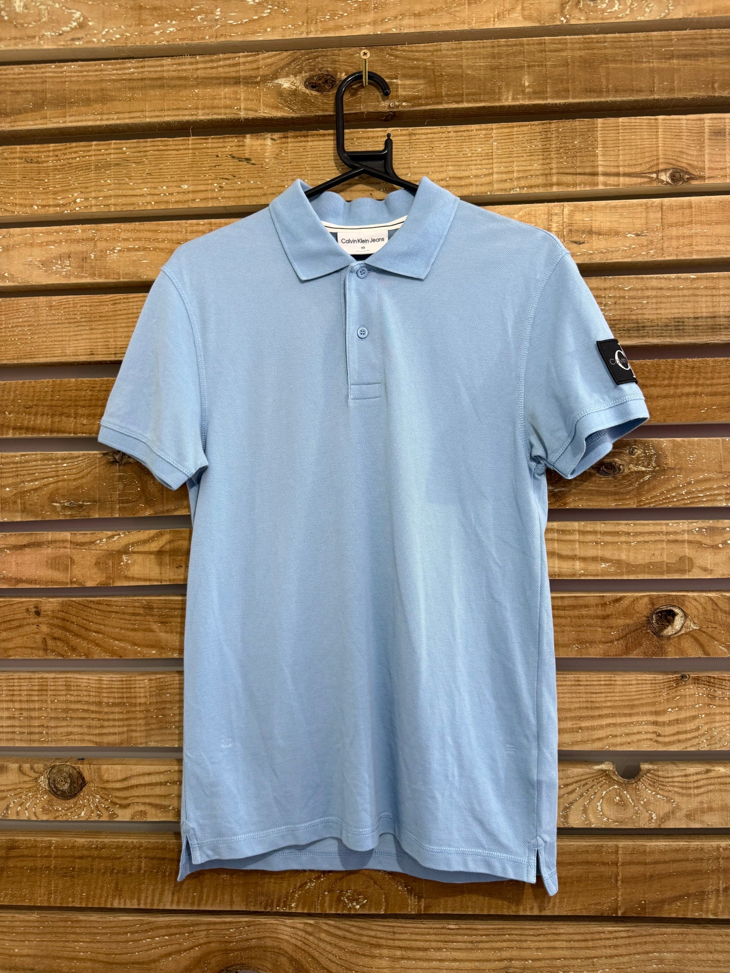 Vintage Y2K Calvin Klein polo shirt. Blue. Size XS. 36” chest.