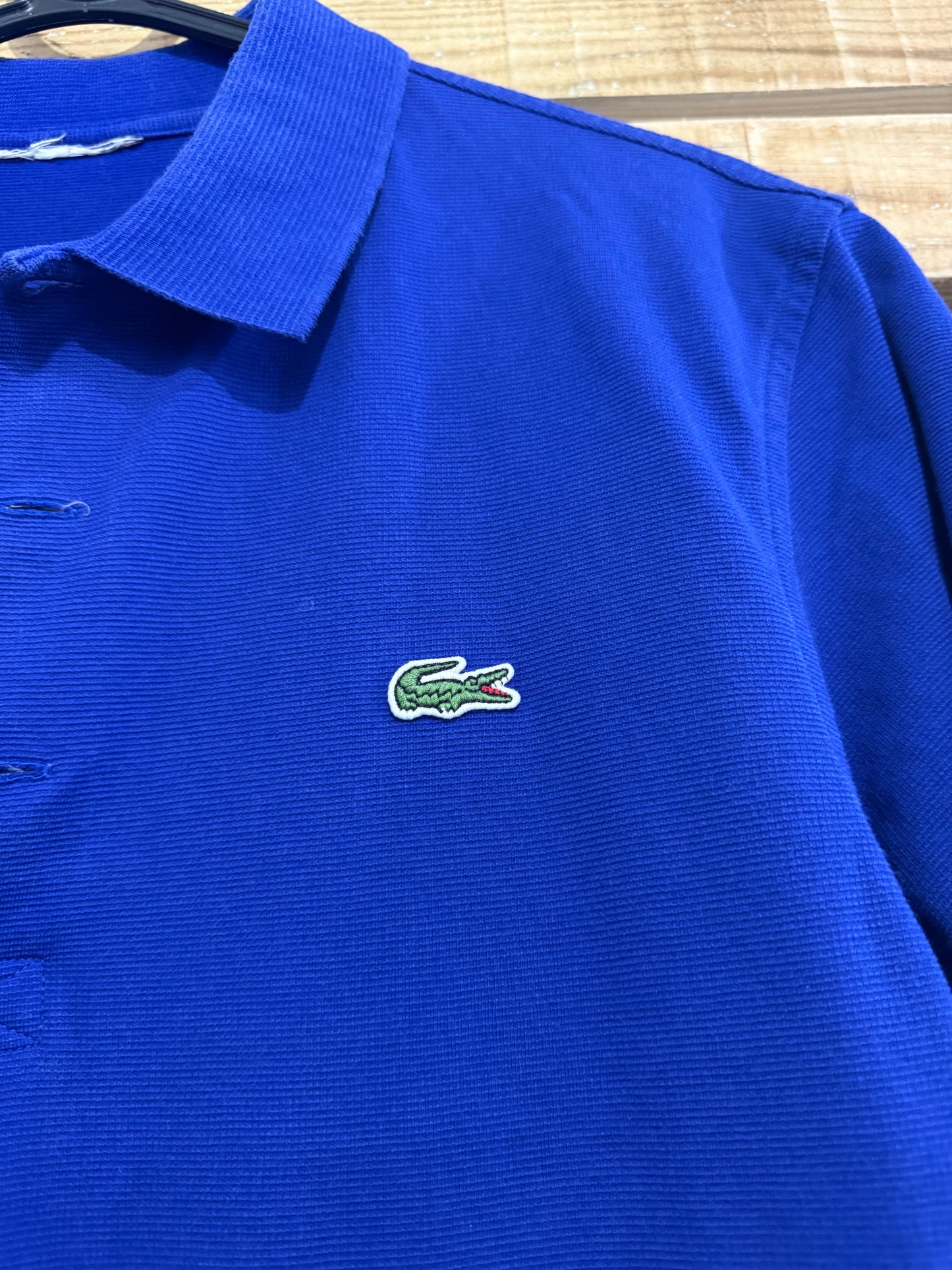 Vintage 90s Lacoste polo shirt. Blue. Size Medium. 44” chest.