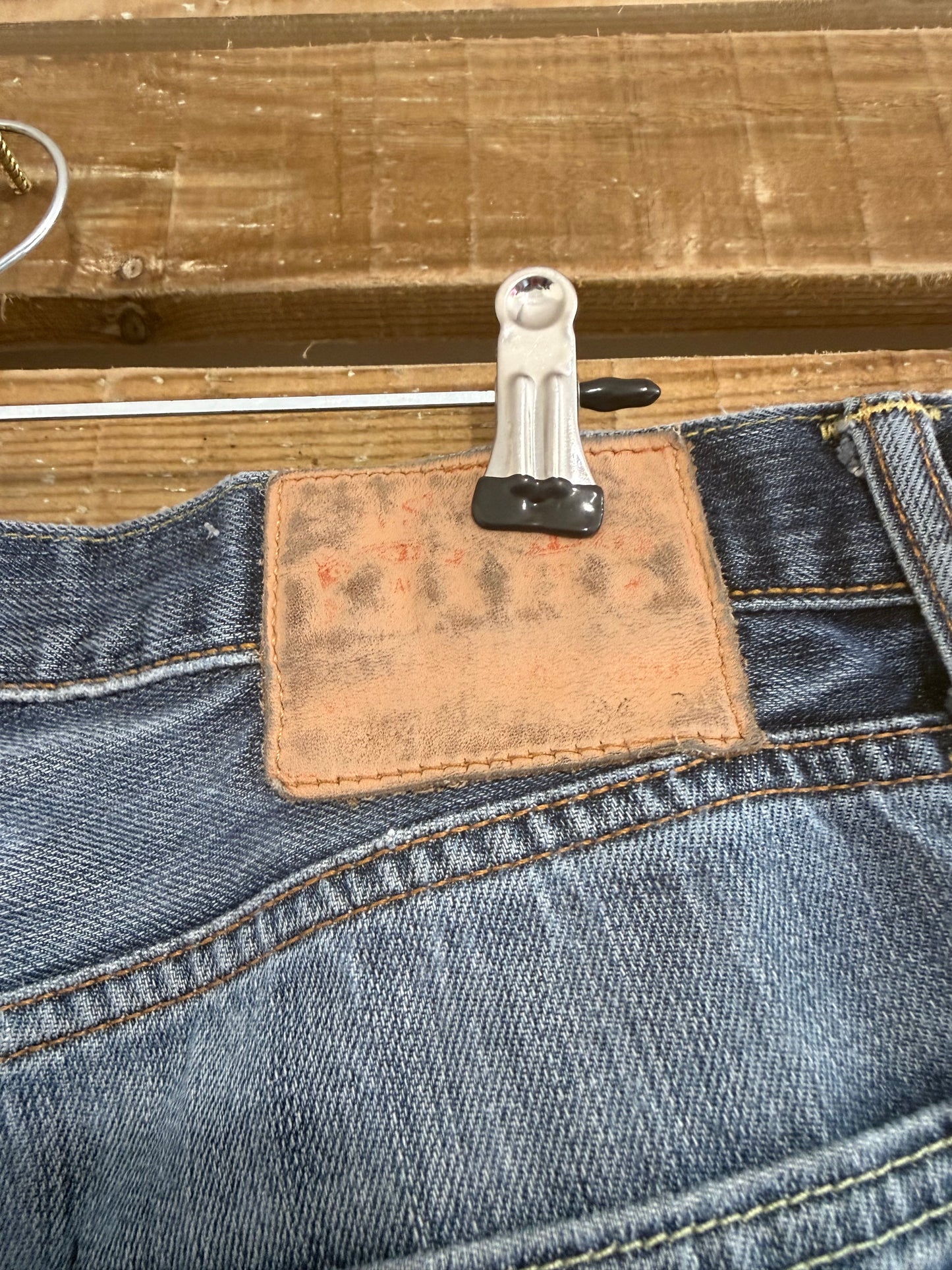 Vintage 90s Levi’s Dark Blue distressed stonewash jeans. Waist 34” leg 32”