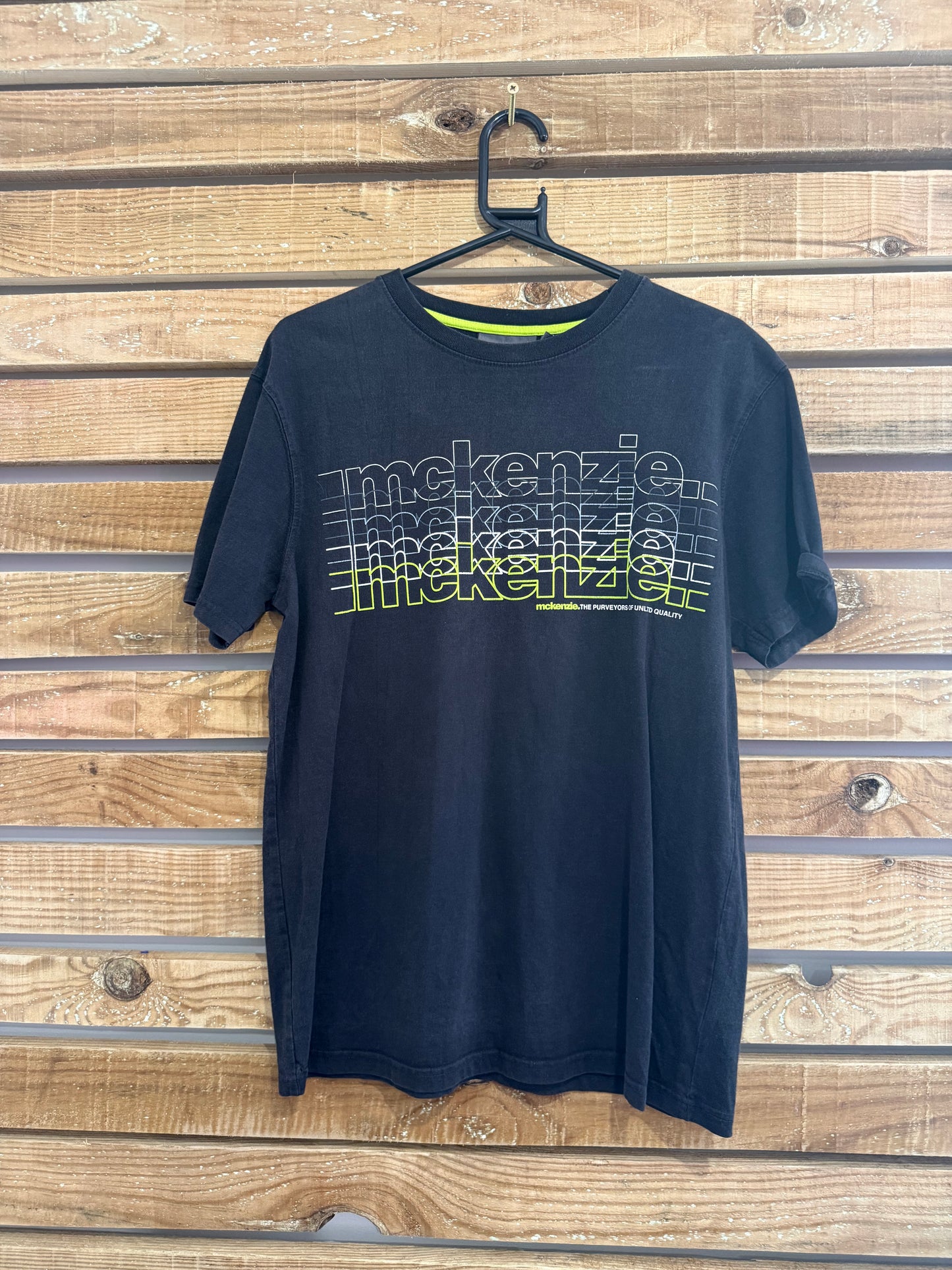 Vintage Y2K McKenzie print motif T-shirt. Black. Size Medium.