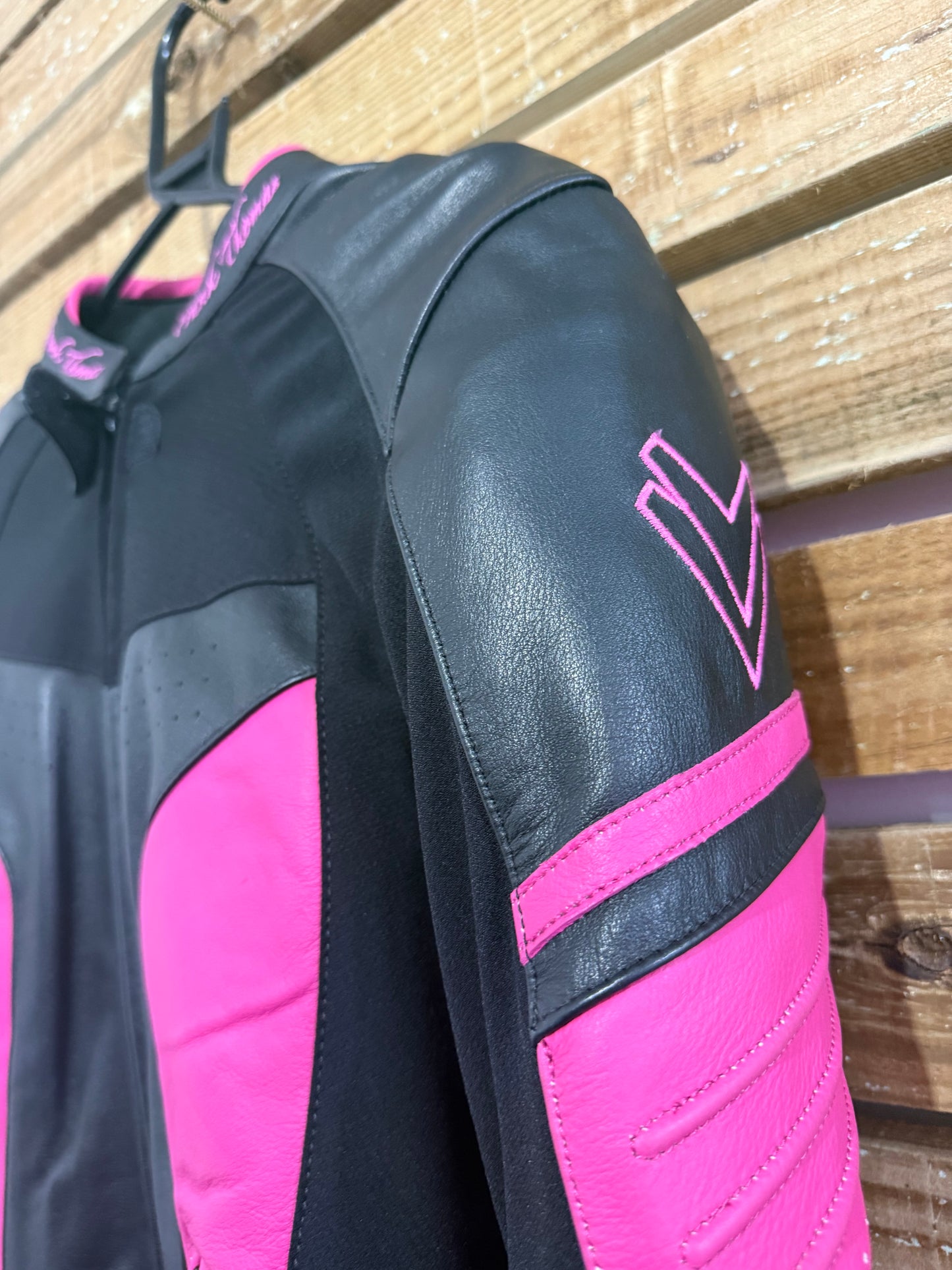 Frank Thomas leather motorcycle racing/ biker jacket. Size 10. Pink & black.